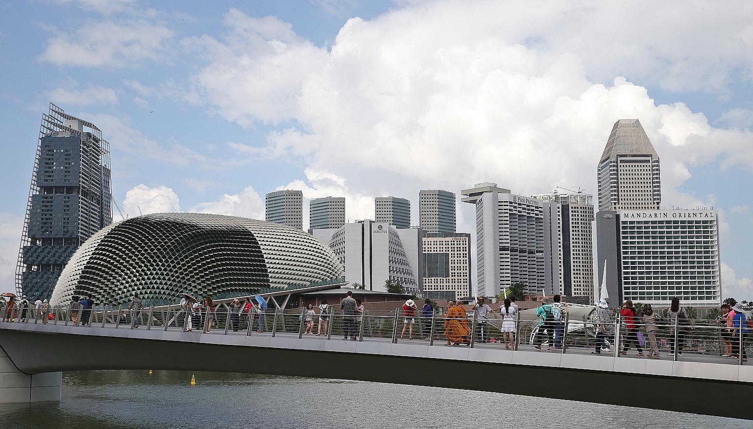 The May 22 ST Run in the City will take runners through some of Singapore's most iconic city landmarks such as Jubilee Bridge (above). Sign-up rates for the event range from $38 to $65.