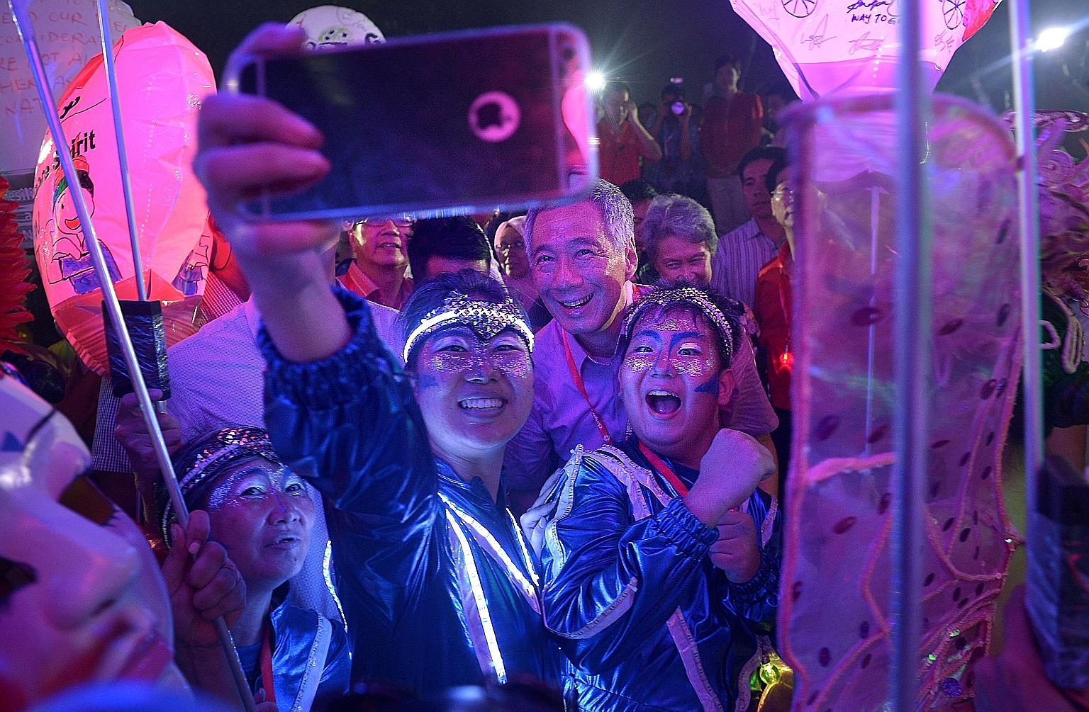 The Chingay festivities moved from downtown Singapore to the heartland last night as 2,000 performers entertained the crowds in Bishan-Ang Mo Kio Park. Prime Minister Lee Hsien Loong and Mrs Lee joined 50,000 people at the Chingay Night Fiesta, which