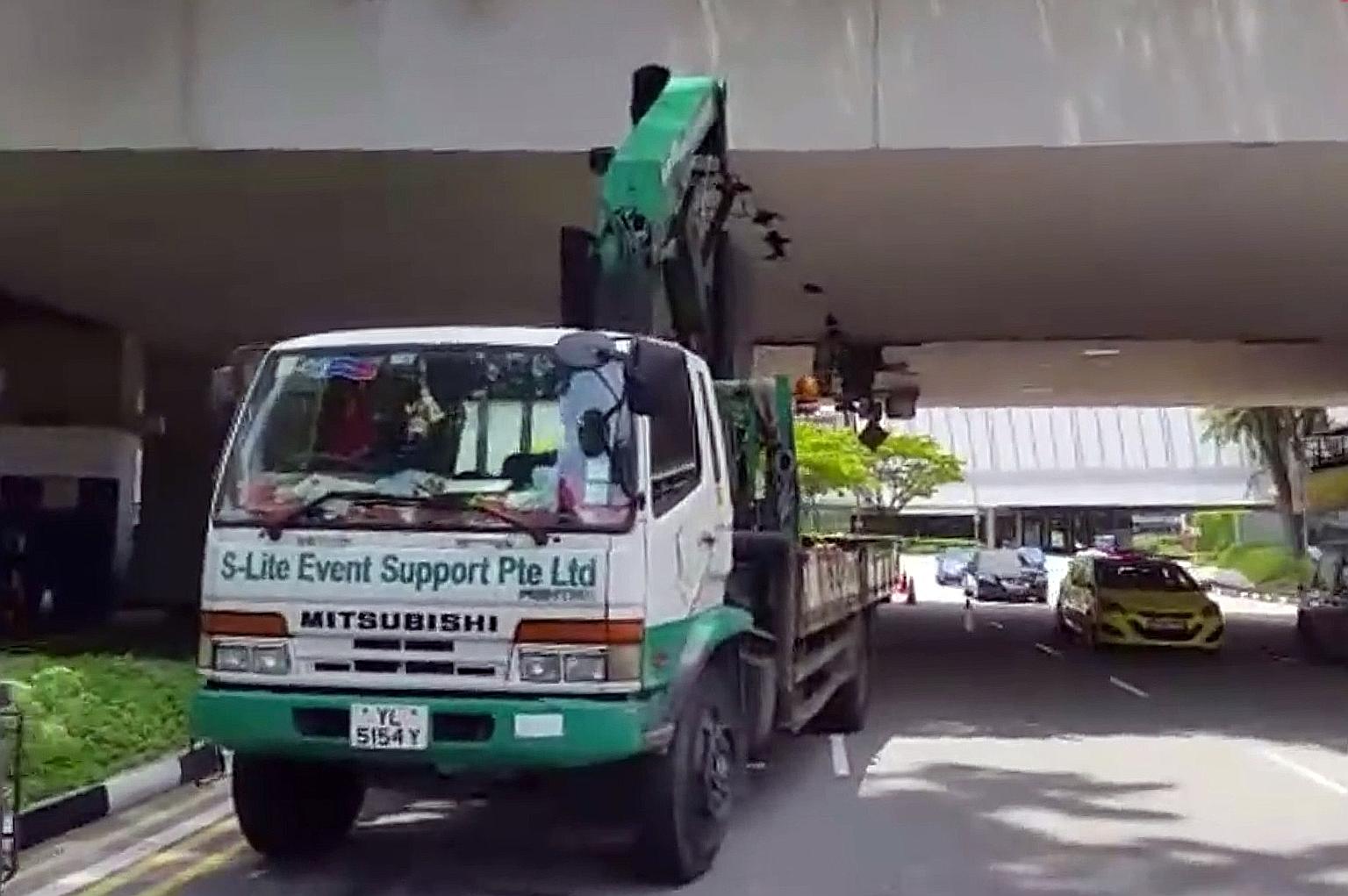 A 56-year-old lorry driver has been arrested in connection with the damage to the bottom of an overhead bridge in Raffles Boulevard. The crane boom, or lifting arm, of the lorry had allegedly caused the damage to the bridge linking Marina Square and 