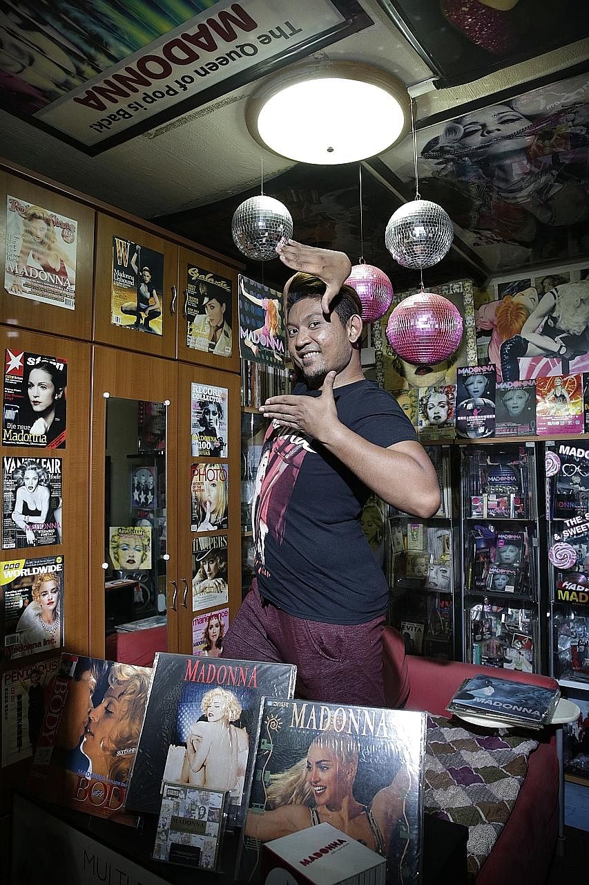Customer service officer Abdul Rahman Selamat says listening to Madonna helps him to relieve stress. Food services executive Panda Tan (right) and his magazine collection of more than 2,000 copies. He tries to get every international cover of every p