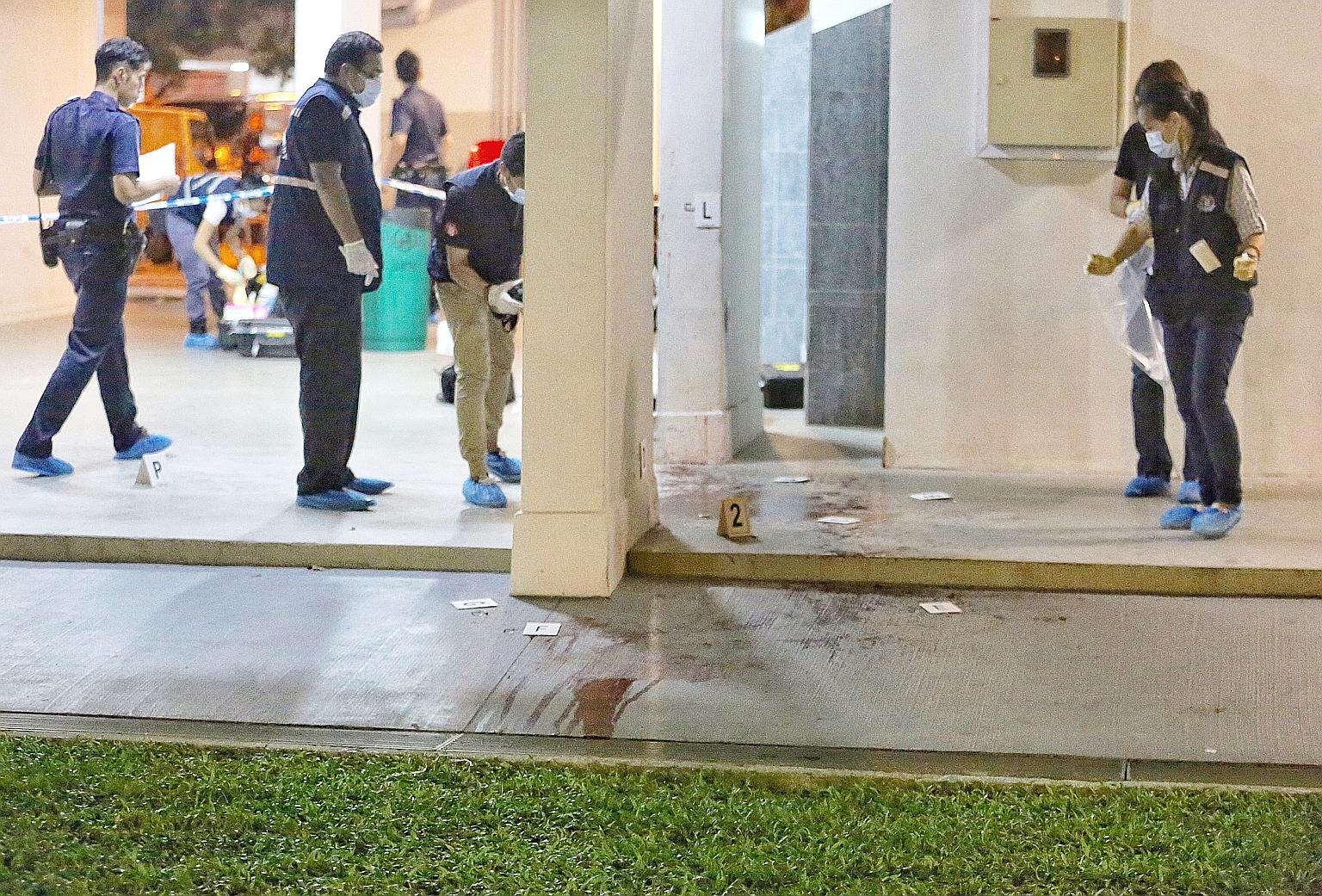 Bloodstains were visible 100m from the coffee shop. Mr Ang, found with neck injuries, was taken to Tan Tock Seng Hospital, where he died.