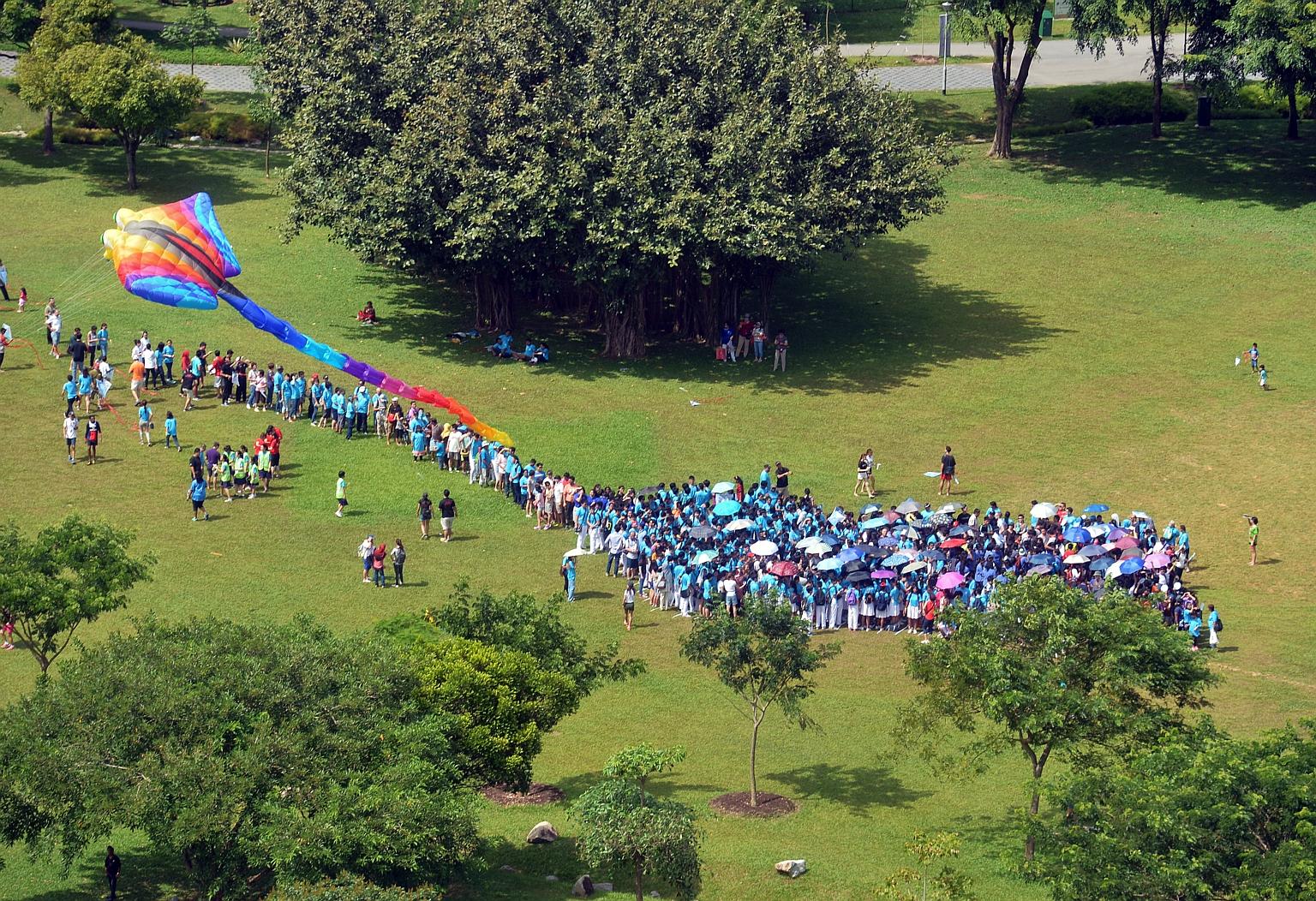 More than 660 people gathered at Bishan-Ang Mo Kio Park yesterday to mark the launch of the 20th-anniversary celebrations for the Down Syndrome Association (Singapore). The group earned a spot in the Singapore Book of Records for the most people asse