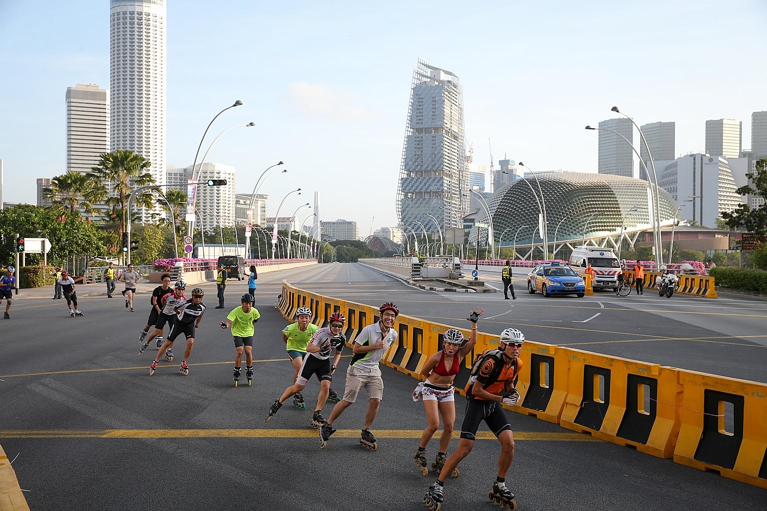 It was clear skies and roads yesterday in the heart of Singapore, as the Civic District and parts of the Central Business District were closed to traffic for the first-ever Car-Free Sunday. Thousands of Singapore residents, including cyclists and rol