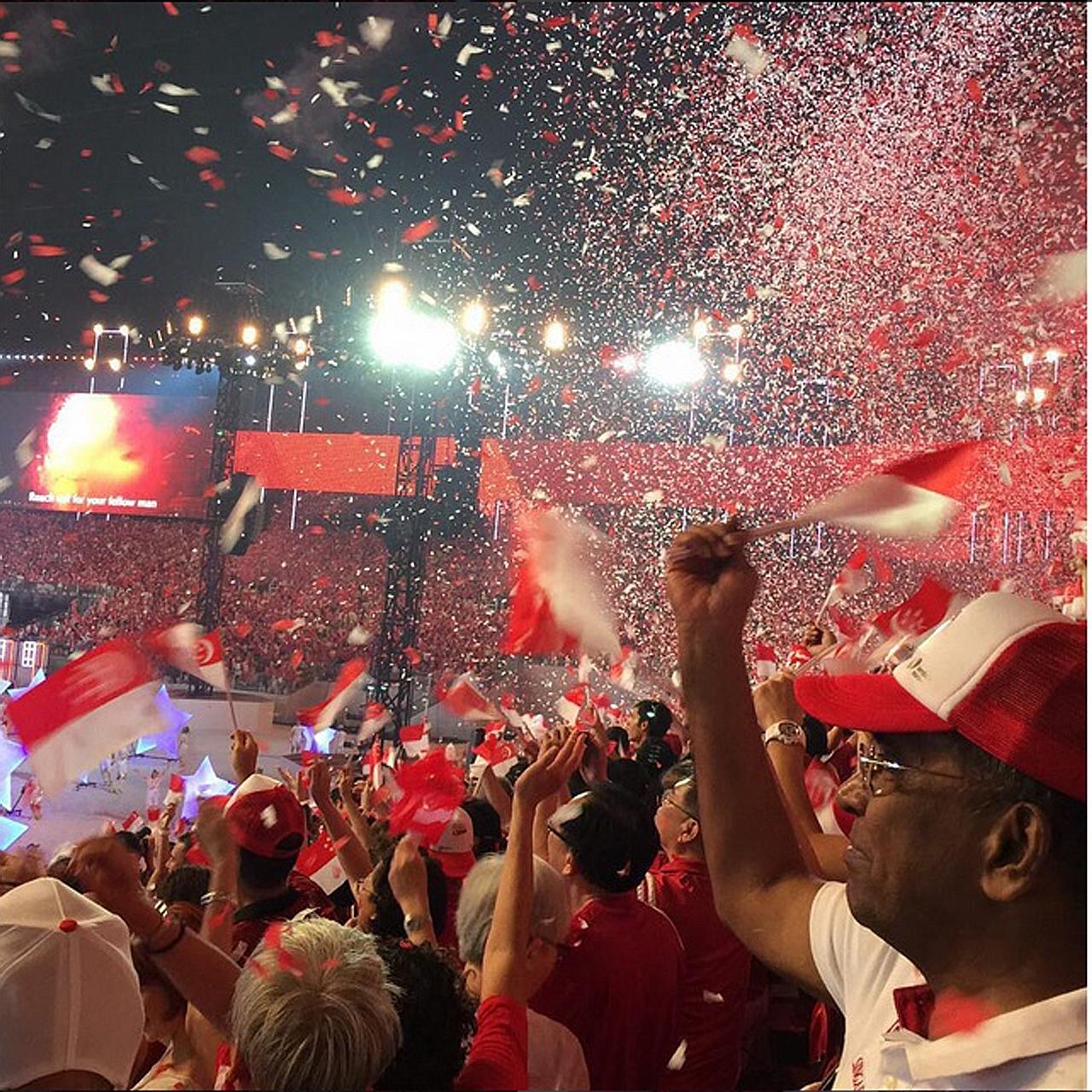 Spectators at last year's Golden Jubilee National Day Parade celebration at the Padang. This year's NDP at the dome-shaped venue at the Sports Hub will be among the costliest Aug 9 shows in a decade, second only to last year's NDP, which cost $40.5 m