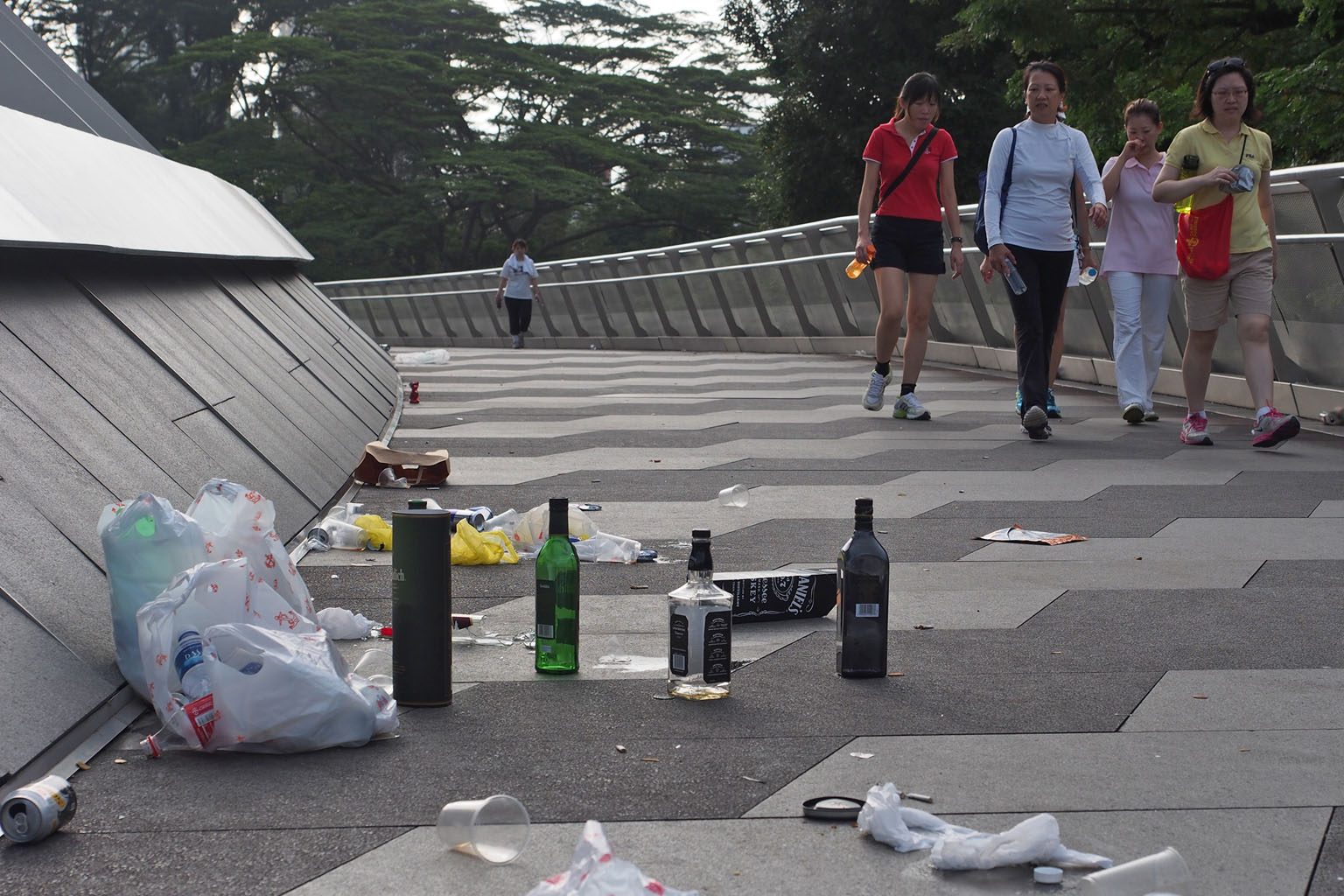 Empty bottles litter the Alexandra Arch bridge in Alexandra Road. Since the community volunteer programme began in 2013, about 340 volunteers have engaged 2,500 litterbugs.