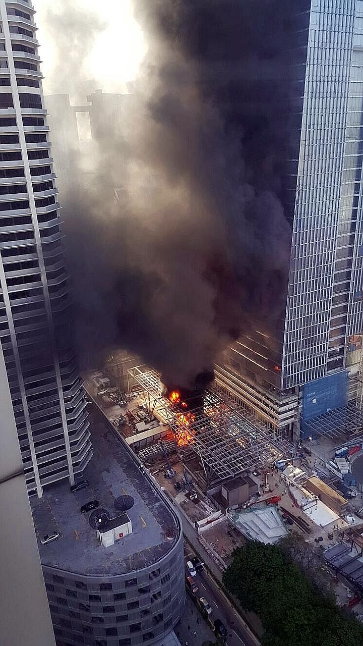 The blaze started just before 6pm yesterday outside the future Tanjong Pagar Centre. SCDF officers found that the fire involved construction materials that occupied an area of about 10m by 10m.