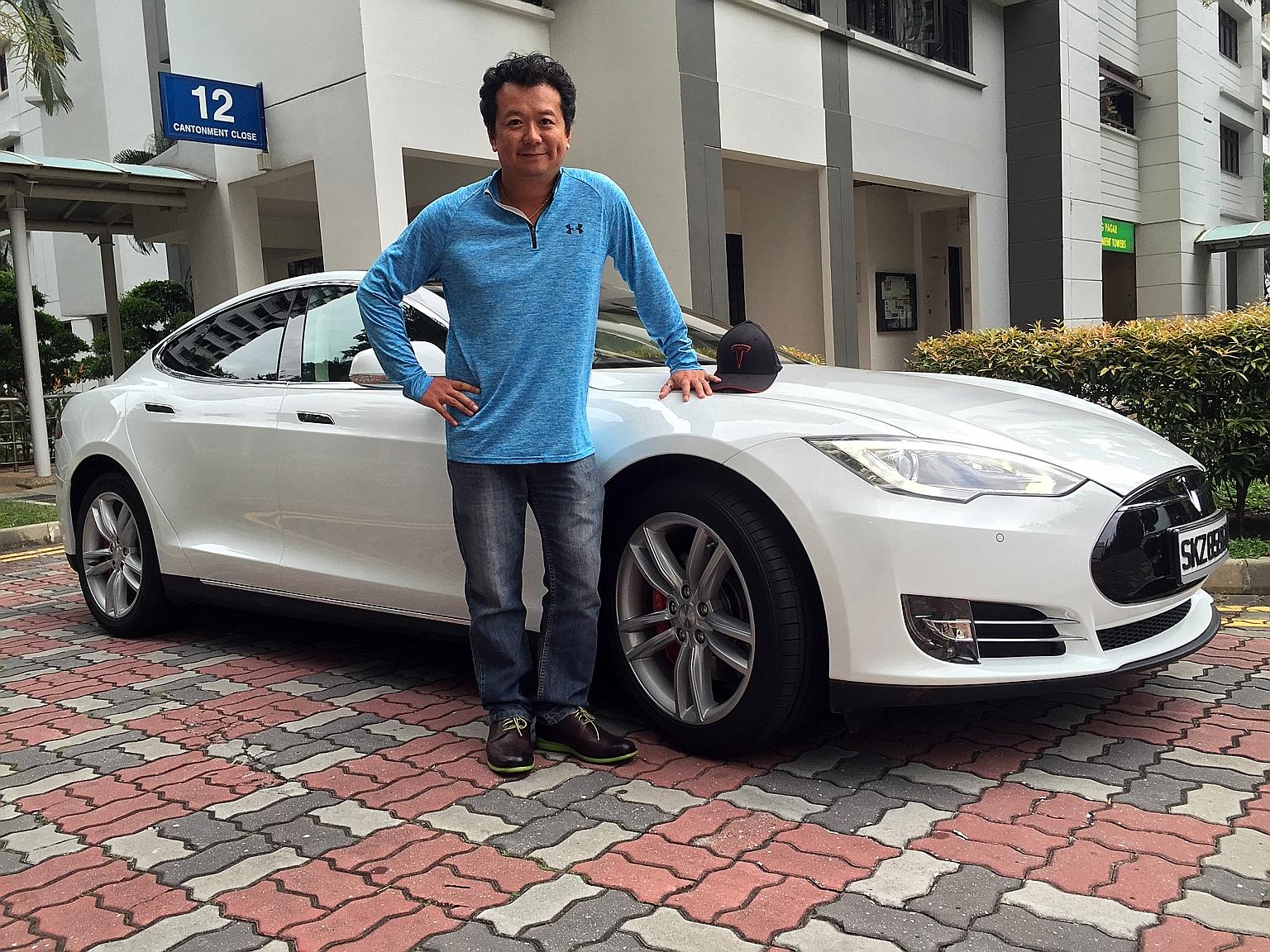Mr Nguyen with the used Tesla Model S, which he sourced from Hong Kong for close to $400,000. The Model S is granted tax breaks in several countries - for example, in Britain, buyers get a $8,800 grant.