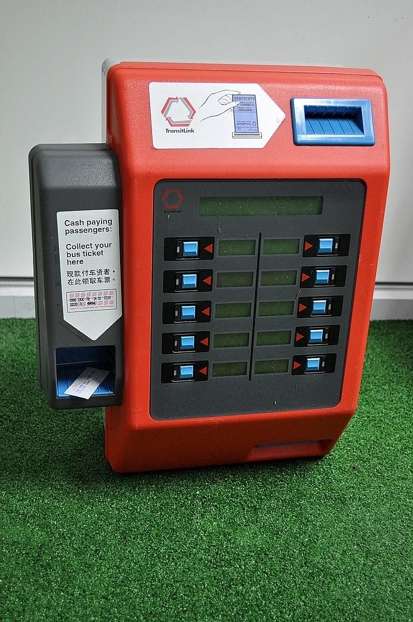 Top: A fare validator, which was used in the 1990s. Above: Before 1990, a bus conductor would dispense a bus ticket after punching a hole in it. A refurbished vintage bus from the 1960s will be on show.