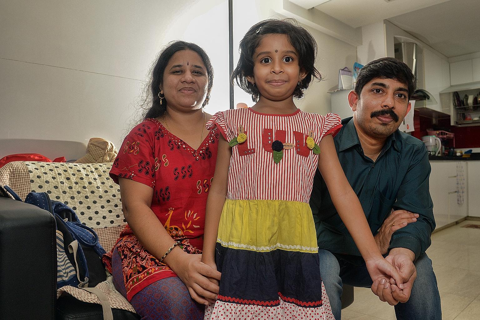 Seven-year-old Videm Sree Vainavi is seen here with her parents - permanent residents Sumalatha Videm and Videm Nagender - who tried unsuccessfully to get her a place at a local school. The family from India is finding it difficult to afford the $1,1