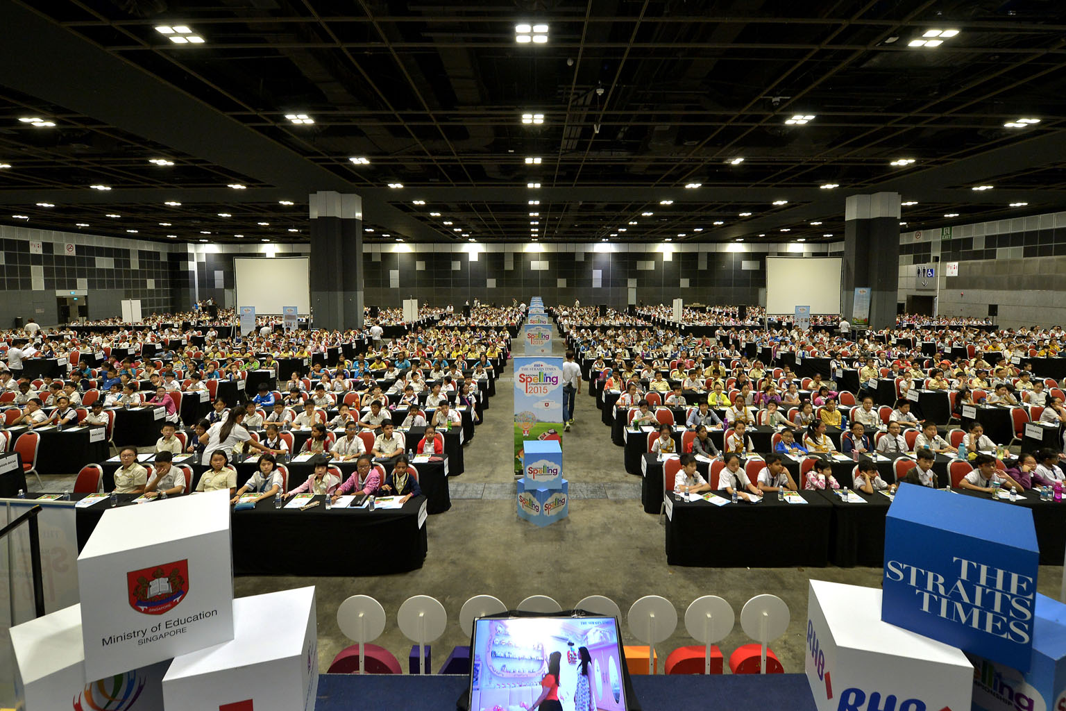 Last year's record of 1,654 participants (above) has been broken this year, with more than 1,800 pupils signing up for the national spelling competition, which kicks off this Saturday at Suntec Singapore. 