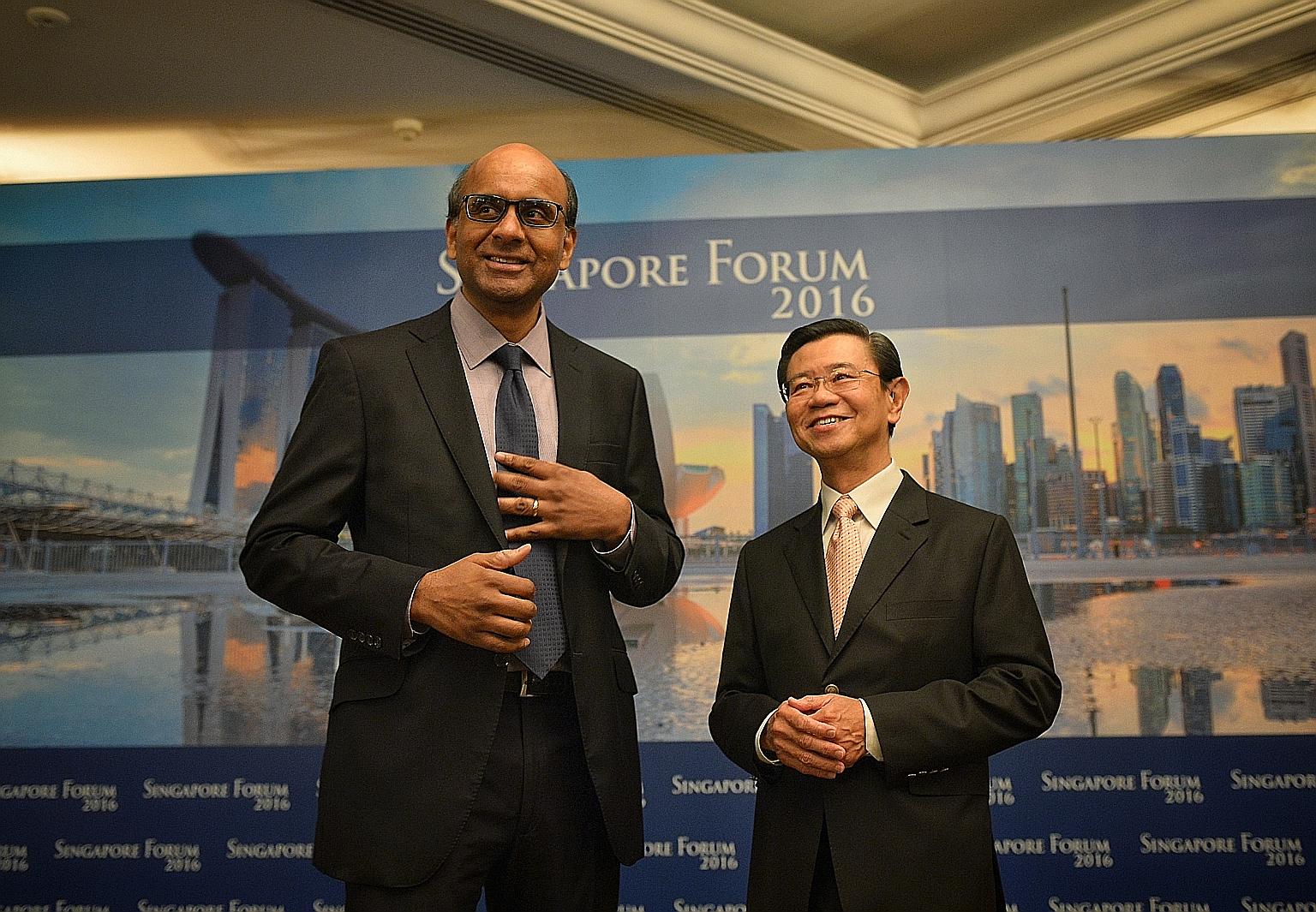 DPM Tharman with former DPM Wong Kan Seng at the Singapore Forum attended by about 250 business leaders, politicians and thought leaders. Mr Wong chairs the forum's advisory board. Mr Tharman, who elaborated on the productivity situation in Singapore