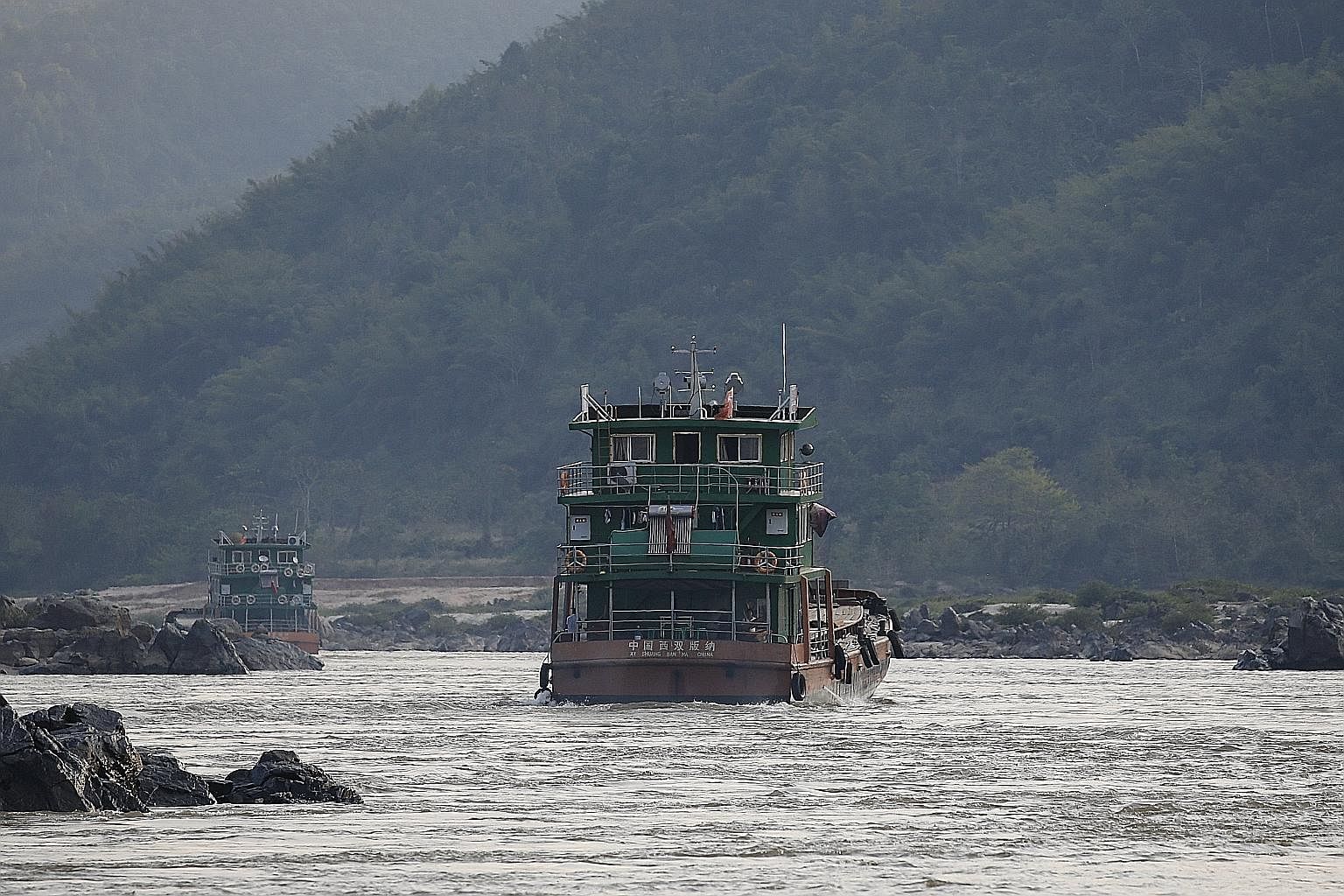 Chinese cargo ships on the Mekong River. Last week, Chinese Premier Li Keqiang offered the five Asean countries along the Mekong River US$11.5 billion (S$15.5 billion) in loans and credit for infrastructure and other projects.