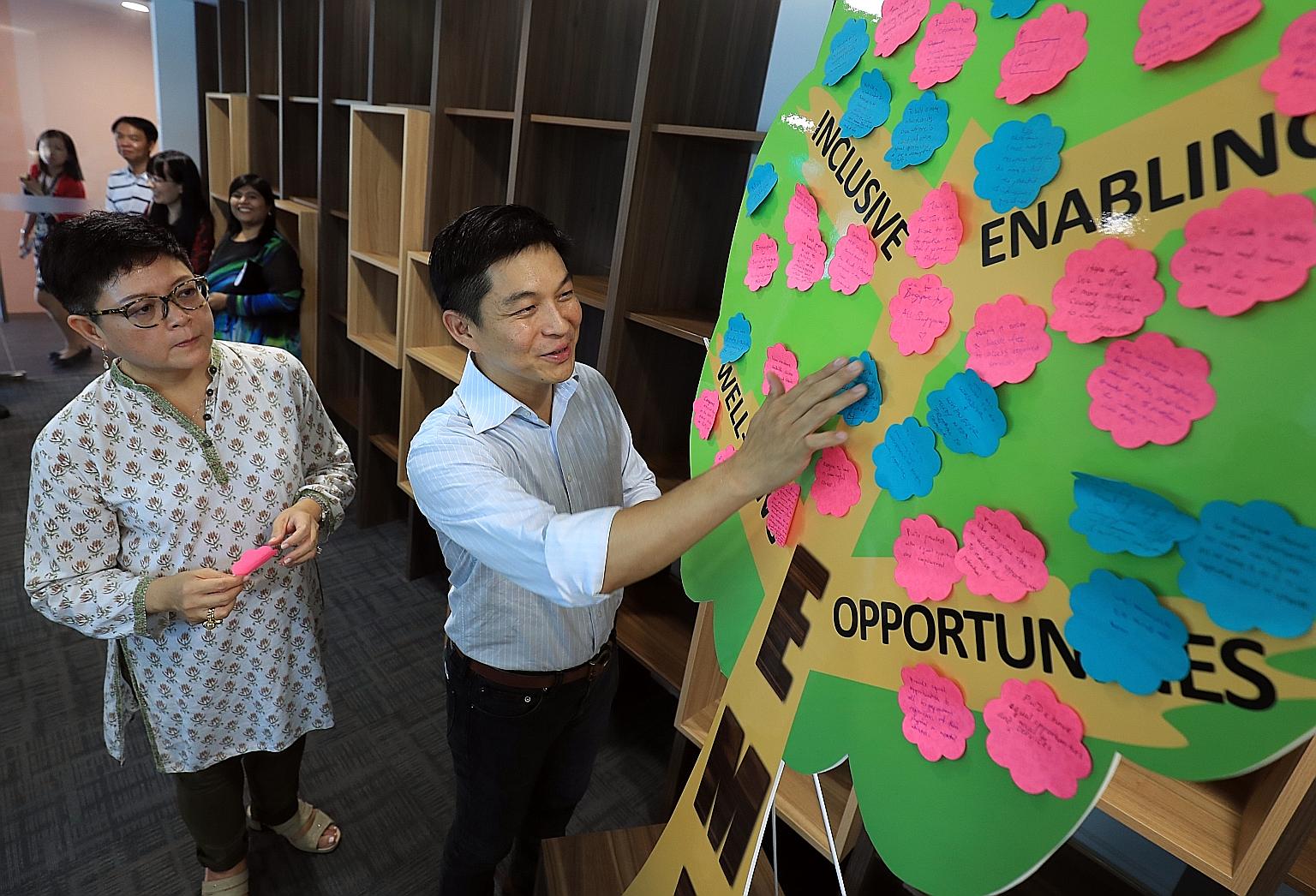 Minister for Social and Family Development Tan Chuan-Jin with Ms Anita Fam, who chairs the 22-member committee for the third Enabling Masterplan.