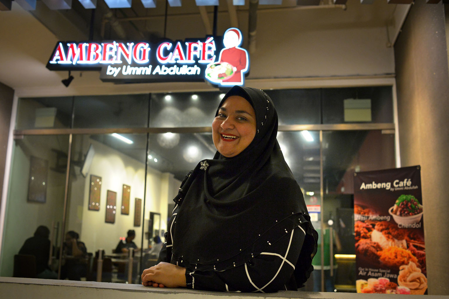 Madam Sa'adah (above) was cited by MP Rahayu Mahzam as a positive example of the spirit of shared responsibility between the Government and the people. Saddled with debts of $100,000 and with three children to feed, Madam Sa'adah met her MP, who arranged