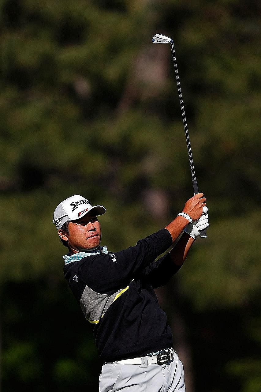 World No. 14 Hideki Matsuyama of Japan playing a shot on the 12th hole during the third round of the Masters. He ended the round two strokes behind leader Jordan Spieth.