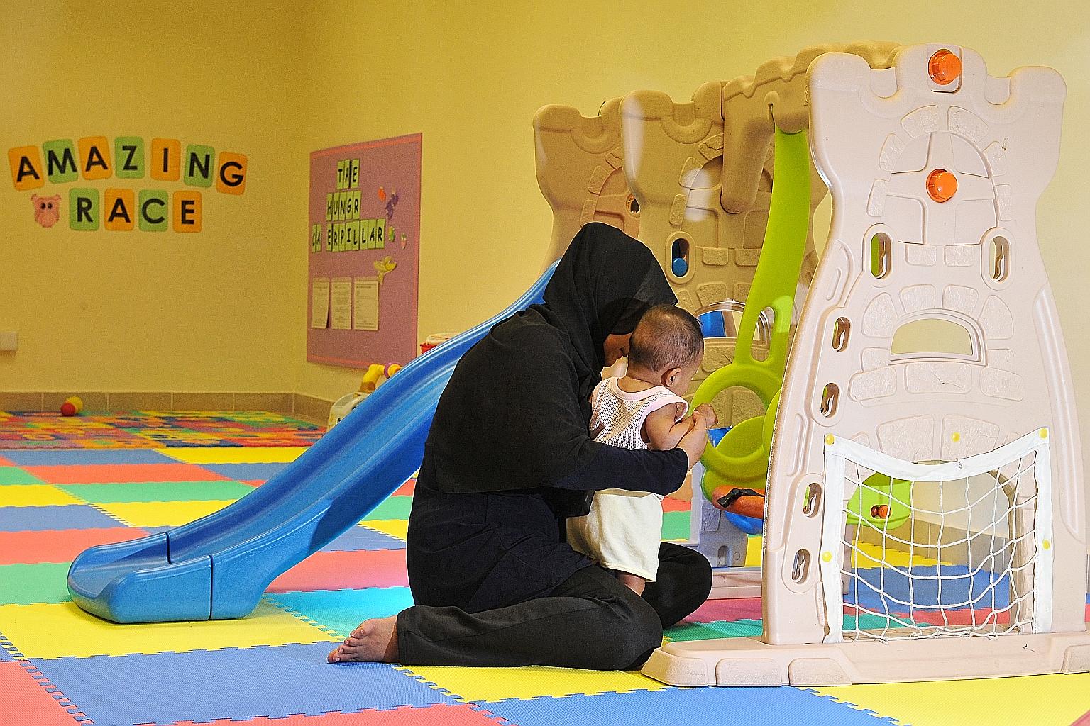 Single mum "Lina" and her six-month-old daughter live in Geylang Serai, one of the five areas where KidStart will be launched in the second half of the year. The scheme will coordinate existing support services provided by different agencies and will