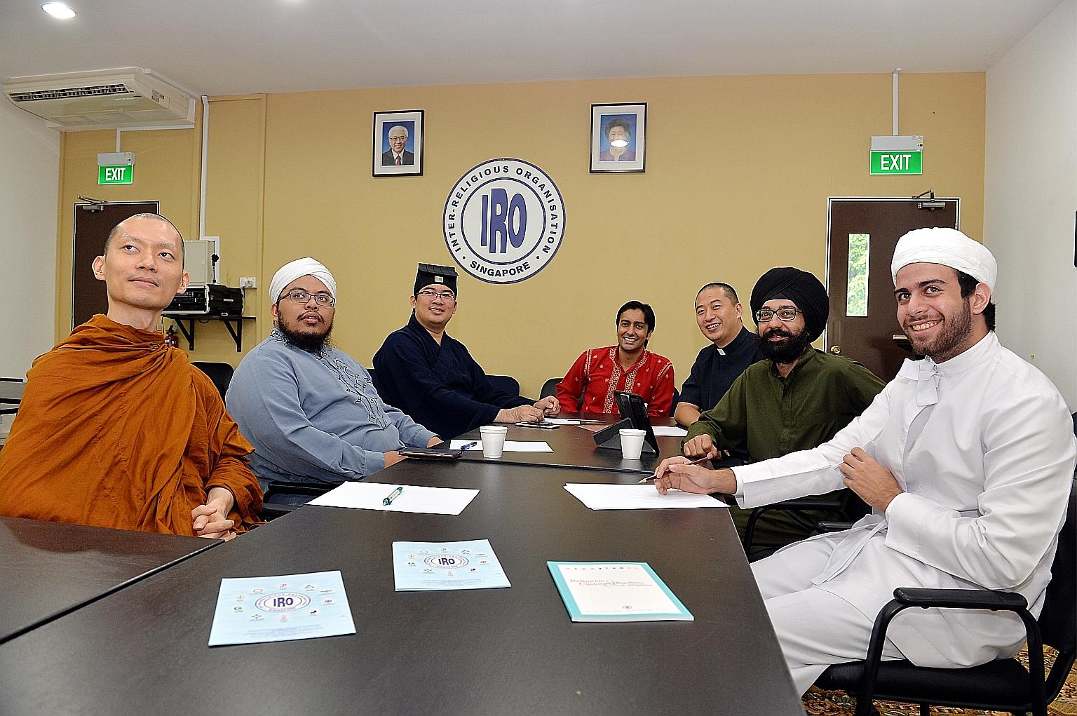 (From left) Venerable Phra Goh Chun Kiang, Ustaz Muslim Amad, Master Chung Kwang Tong, Mr Shivanand Rai, Father Samuel Lim, Dr Pritpal Singh and Zoroastrian priest Ervad Zeus Percy Khambatta, members of the Inter-Religious Organisation (IRO) Youths,