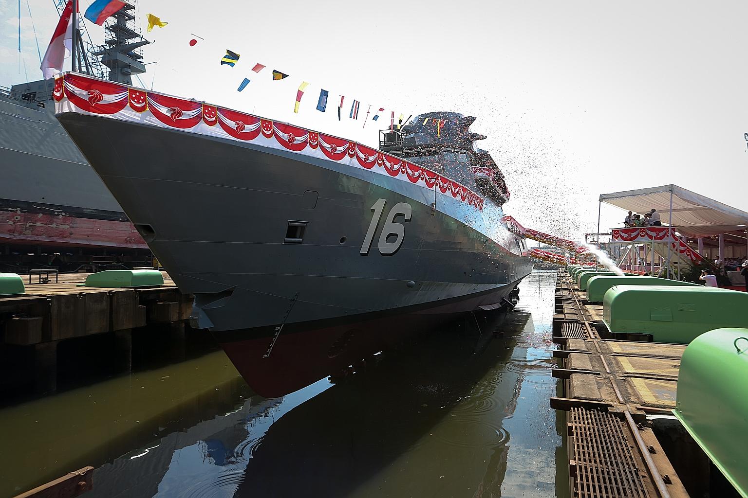 The LMV Sovereignty at Singapore Technologies Marine's Benoi Yard yesterday. The new warship is 80m long, powered by four engines and can hit top speeds in excess of 27 knots and sail up to 3,500 nautical miles. It will now have combat systems instal