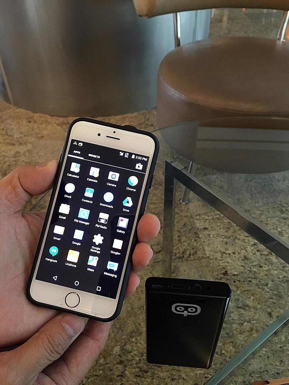 Qongle works as a forwarding device, routing calls and SMS messages over the Internet to the travelling smartphone it is paired with.