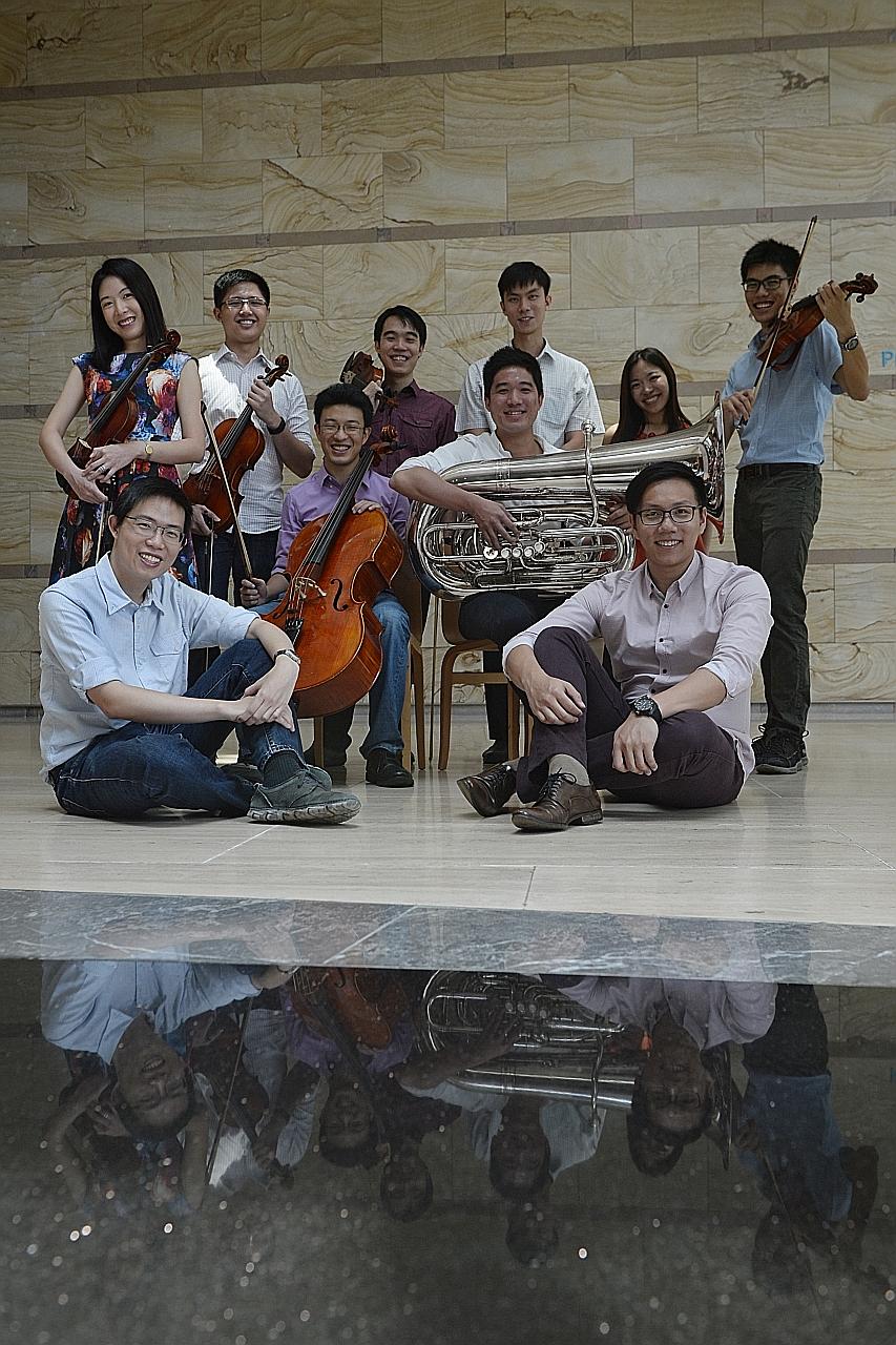 Some of the OMM members at the Esplanade: (standing from left) Candice Lau, 28, Toh Xue Qian, 24, Lee Guan Wei, 28, Herbert Fan, 29, Amelia Leo, 26, and Goh Eng Han, 21; and (seated from left) Christopher Cheong, 27, Yeo Ying Hao, 25, Tan Yao Cong, 2