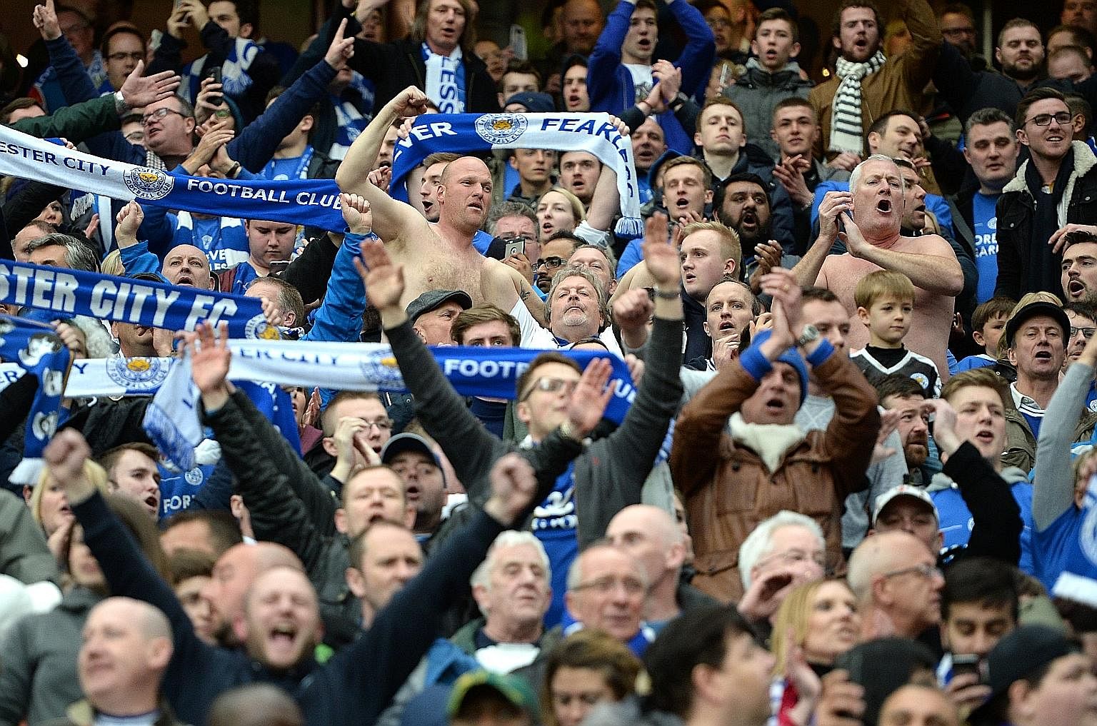 Leicester fans cheering after the English Premier League football match between Leicester City and Manchester United in Manchester on Sunday. The match ended 1-1.