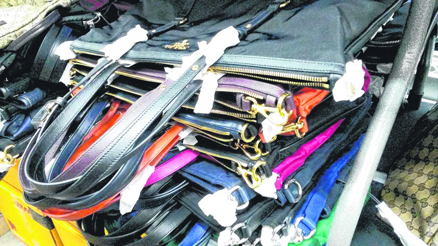 Brand-name bags sold at a public event organised by LovethatBag. Yu, the online retailer's partner, was fined $190,000 on April 27 for evading more than $50,000 in GST.