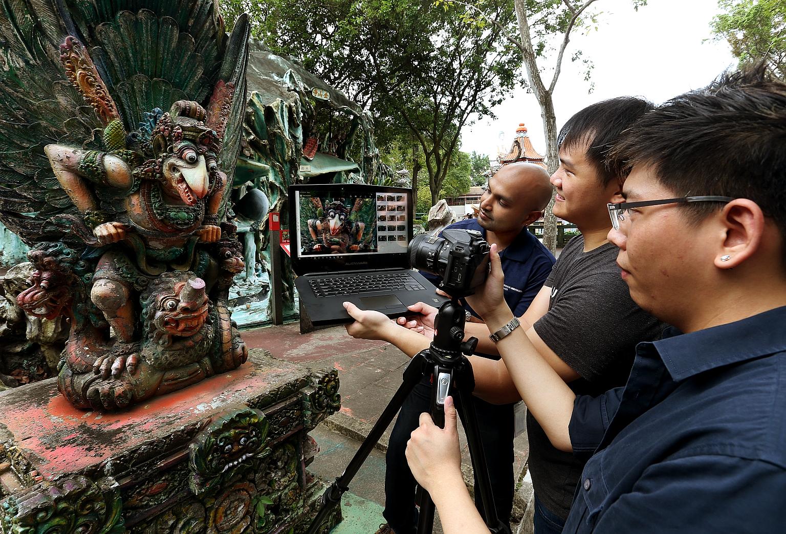 (From left) Autodesk engineers Mr Karthik; Michael Tay, 26; and Koh Naimin, 26. The team, working with the National Heritage Board, has visited Haw Par Villa repeatedly to photograph the Garuda sculpture using the new 3D-modelling software ReMake.