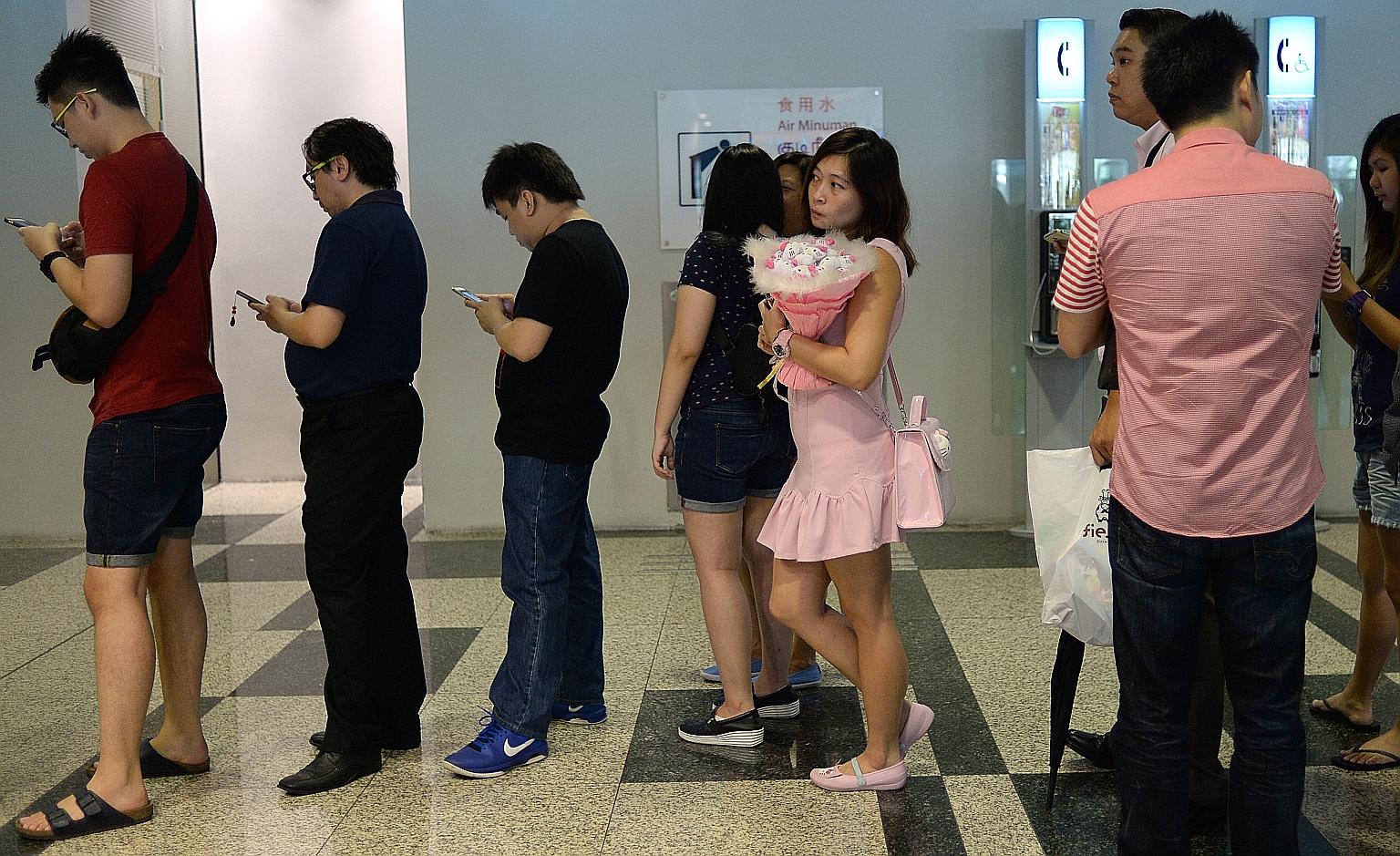 Fans of Hello Kitty were feline excited yesterday ahead of the opening of the cuddly cartoon character's first themed cafe in Singapore. 	The Hello Kitty cafe at Changi Airport's Terminal 3 opened its doors at 11.30am but some customers got in line a