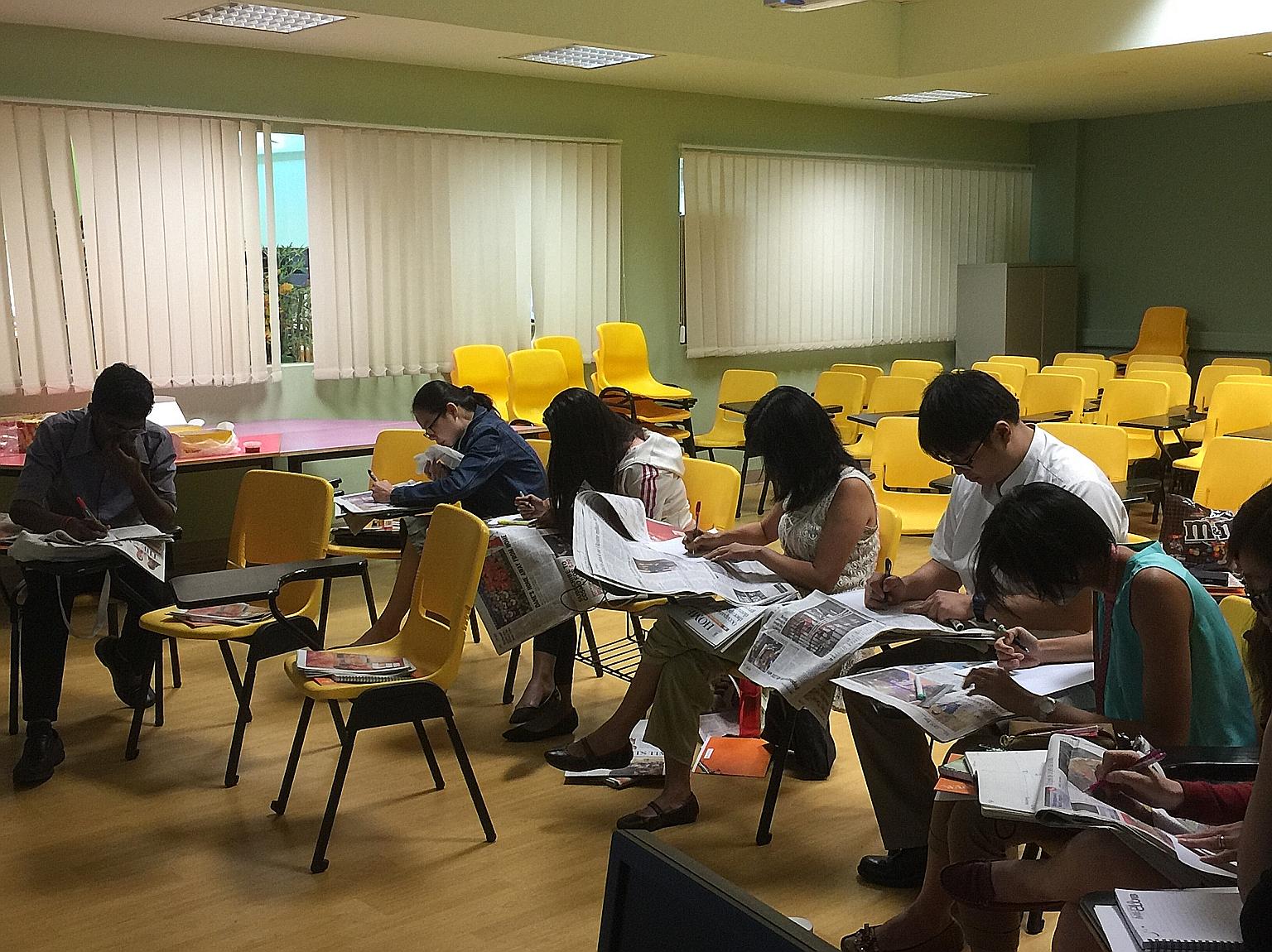 Teachers from West Spring Secondary School at an earlier journalism workshop conducted by The Straits Times Schools. The new day-long course on writing feature articles will run in June and takes a fun approach to the process of learning.