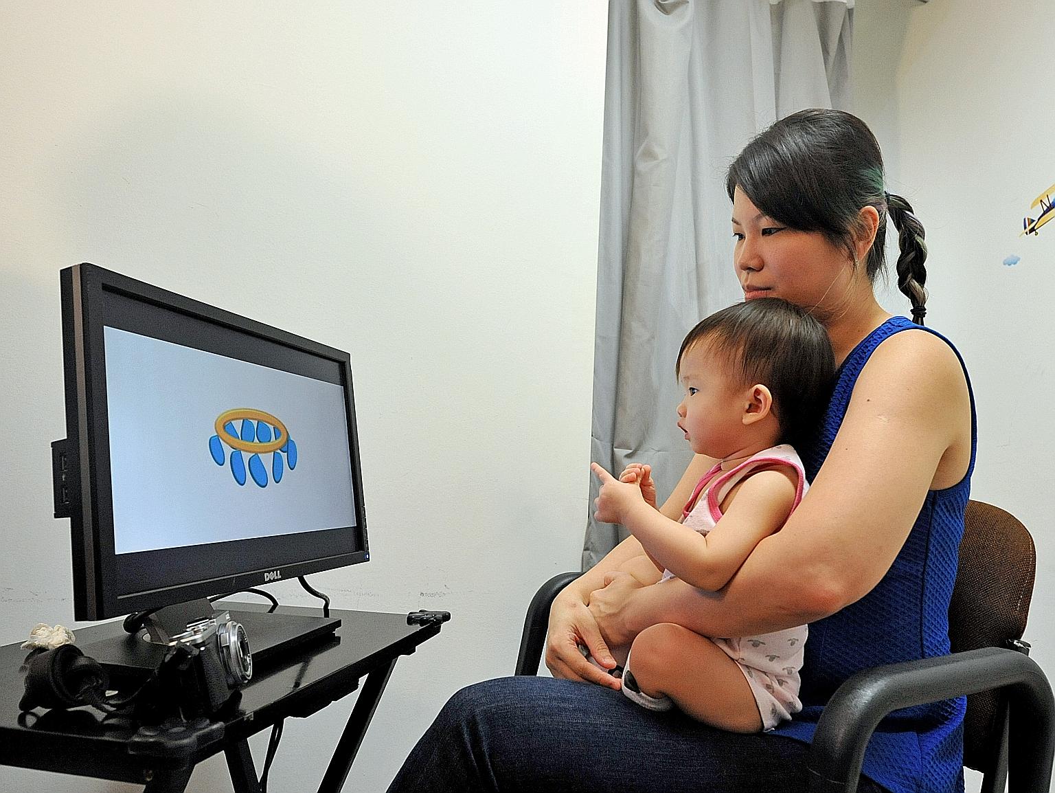 Mrs Wong (above) wants her 14-month-old baby, Zelene, to pick up both English and Mandarin in the future. The study's lead author, Prof Singh, says its findings are reassuring for parents concerned that exposing their infants to two languages would c