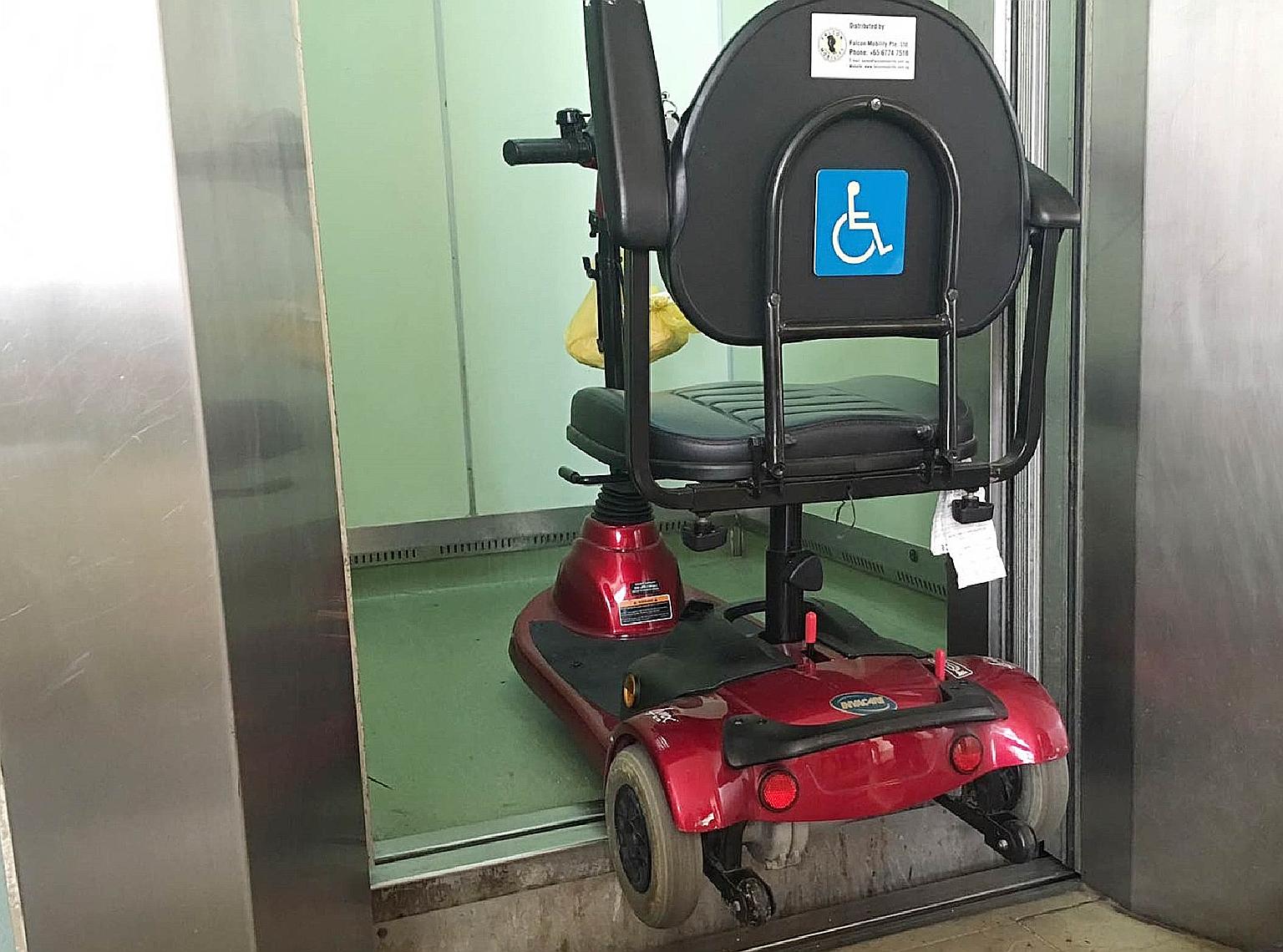 Mr Lim Hang Chiang's mobility device (far left) tipped as the floor of the lift was about 15cm higher than that of the lobby when the doors opened. (Left) A notice put up on the suspension of lift operation.
