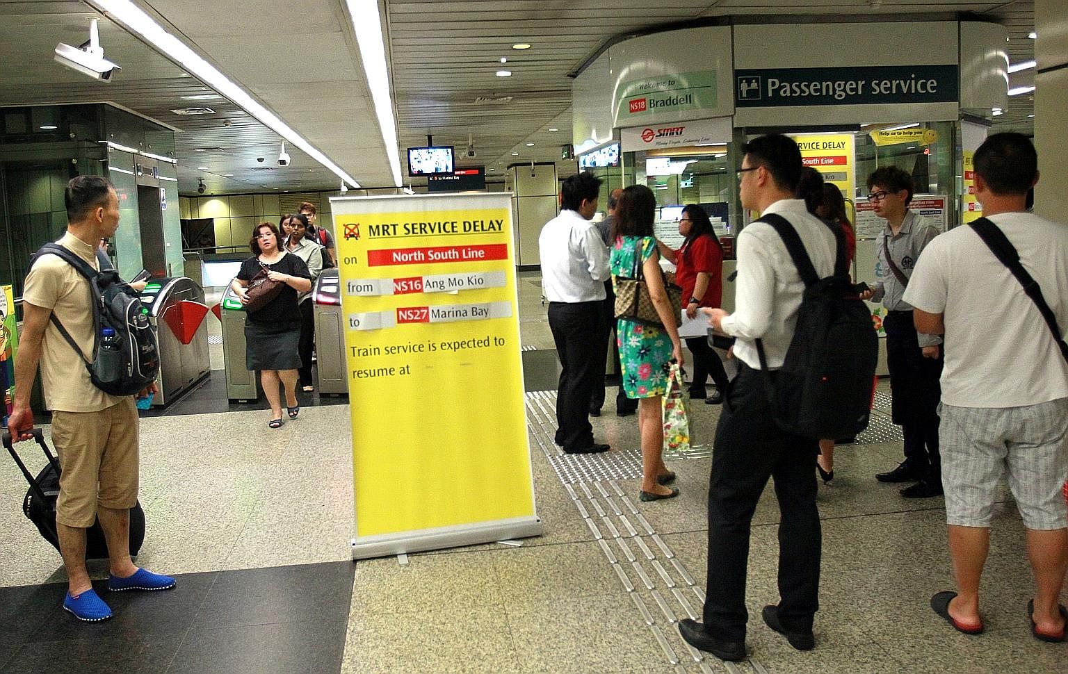 Commuters at Braddell MRT alerted of a disruption on Jan 21, 2014. Singapore's networkhad 14 major breakdowns in 2014. Last year, it had 29 major rail disruptions - 3.6 times that of Hong Kong's older, longer and more heavily-laden system.