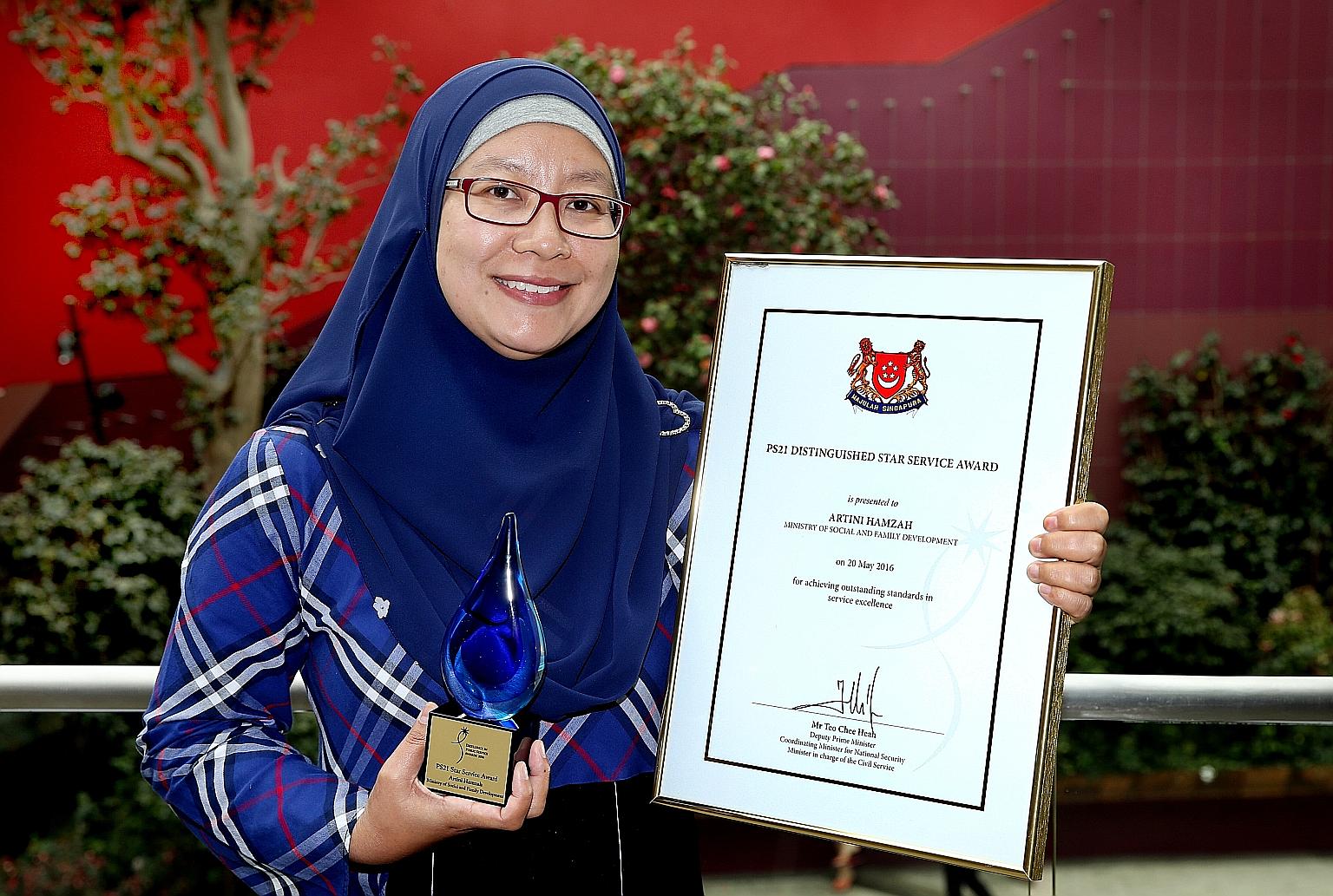 Madam Artini received the PS21 Distinguished Star Service Award yesterday. She went for sign language classes twice a week for six weeks to communicate better with a teen on probation, who is hearing impaired.