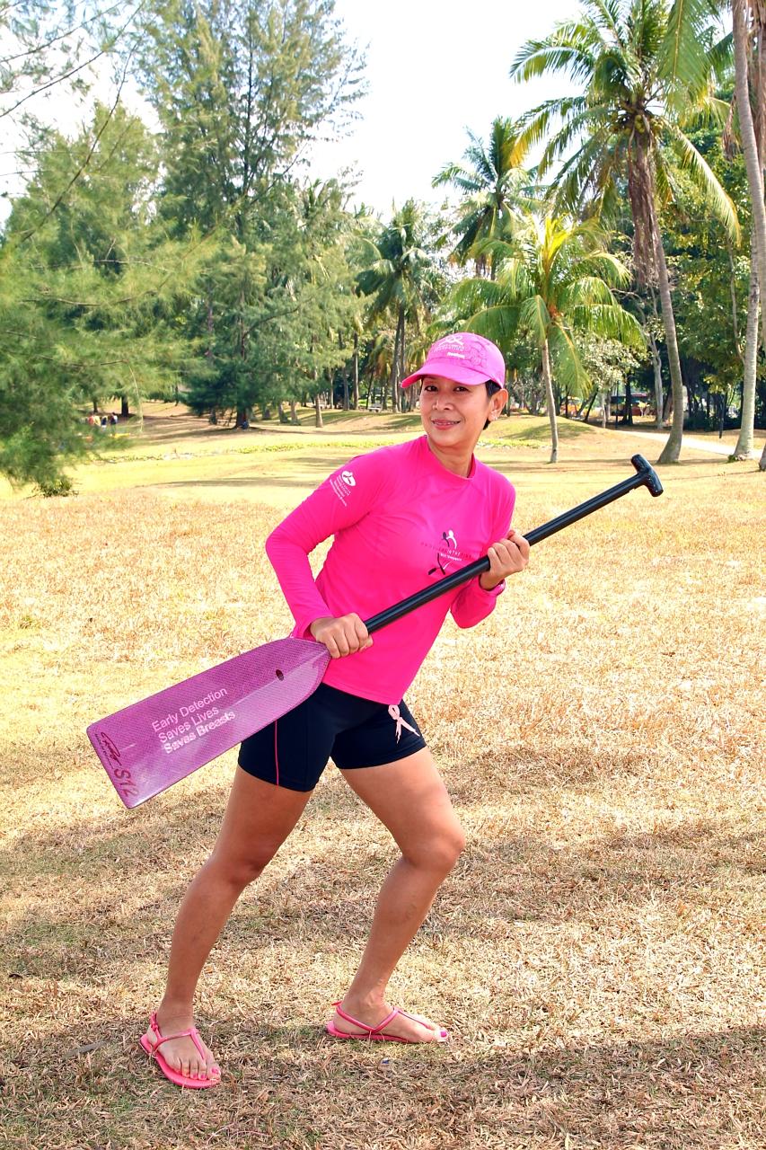 Ms Chui enjoys the team camaraderie and adrenaline rush of a dragon boat race.