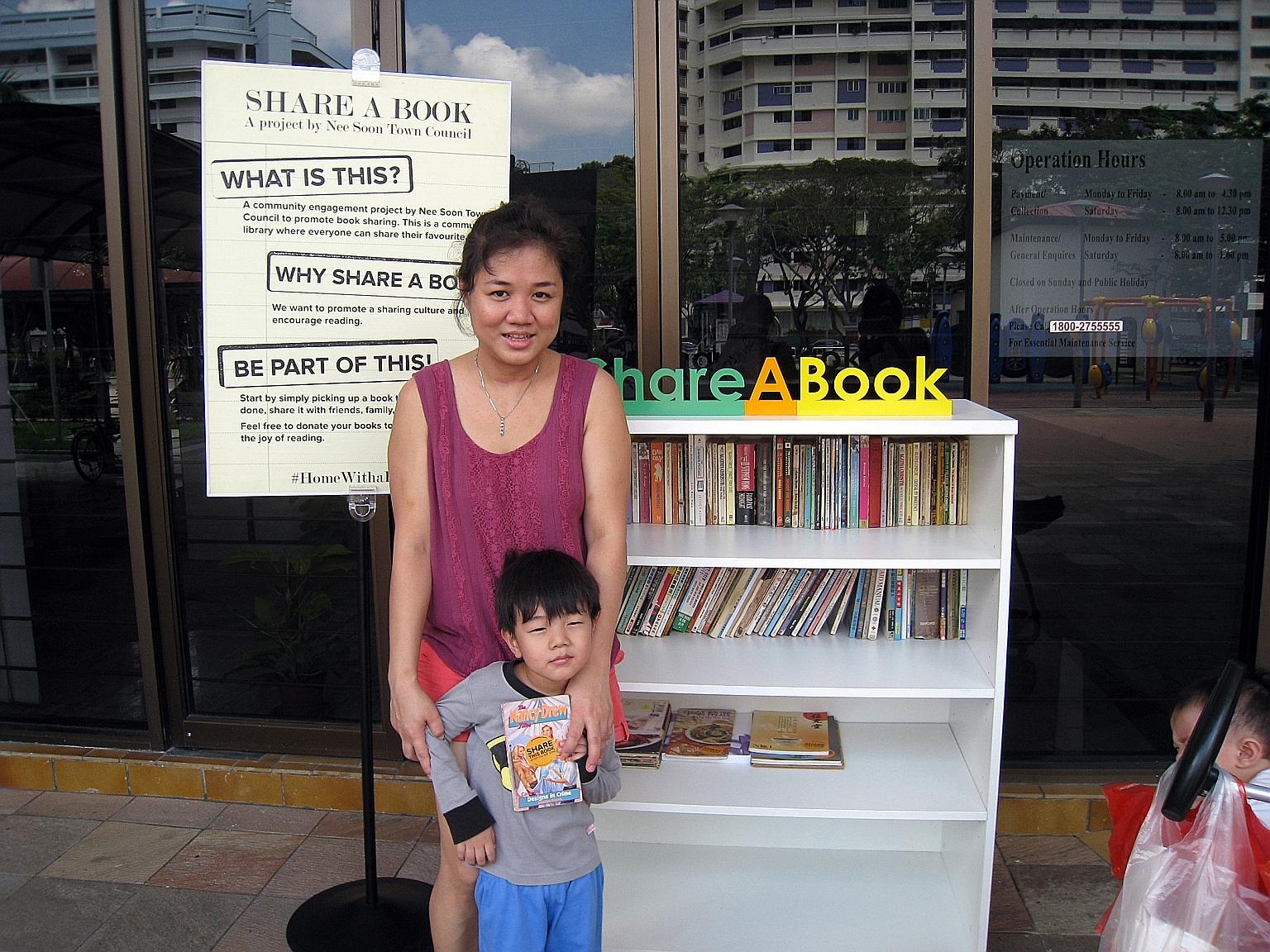 Nee Soon resident Meyar Lwin, 34, says she has taken a few comic books for her son from the neighbourhood's book exchange corner, which is located outside the town council office at Block 290, Yishun Street 22.