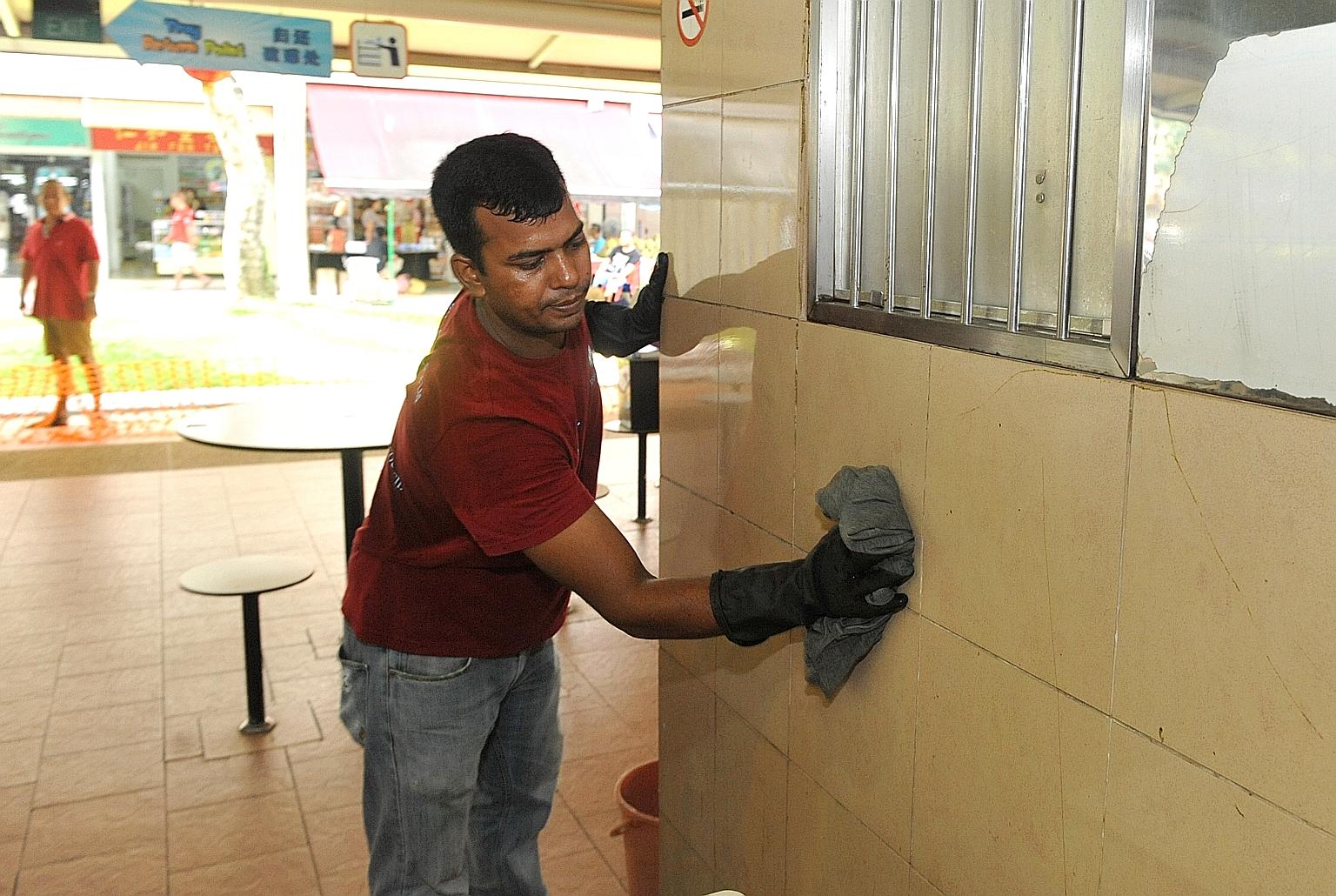 Cleaners were scrubbing the walls and giving the steam treatment yesterday at Pek Kio Market and Food Centre, which has been closed for two days. Hawkers were washing their utensils, crockery and stall floors.