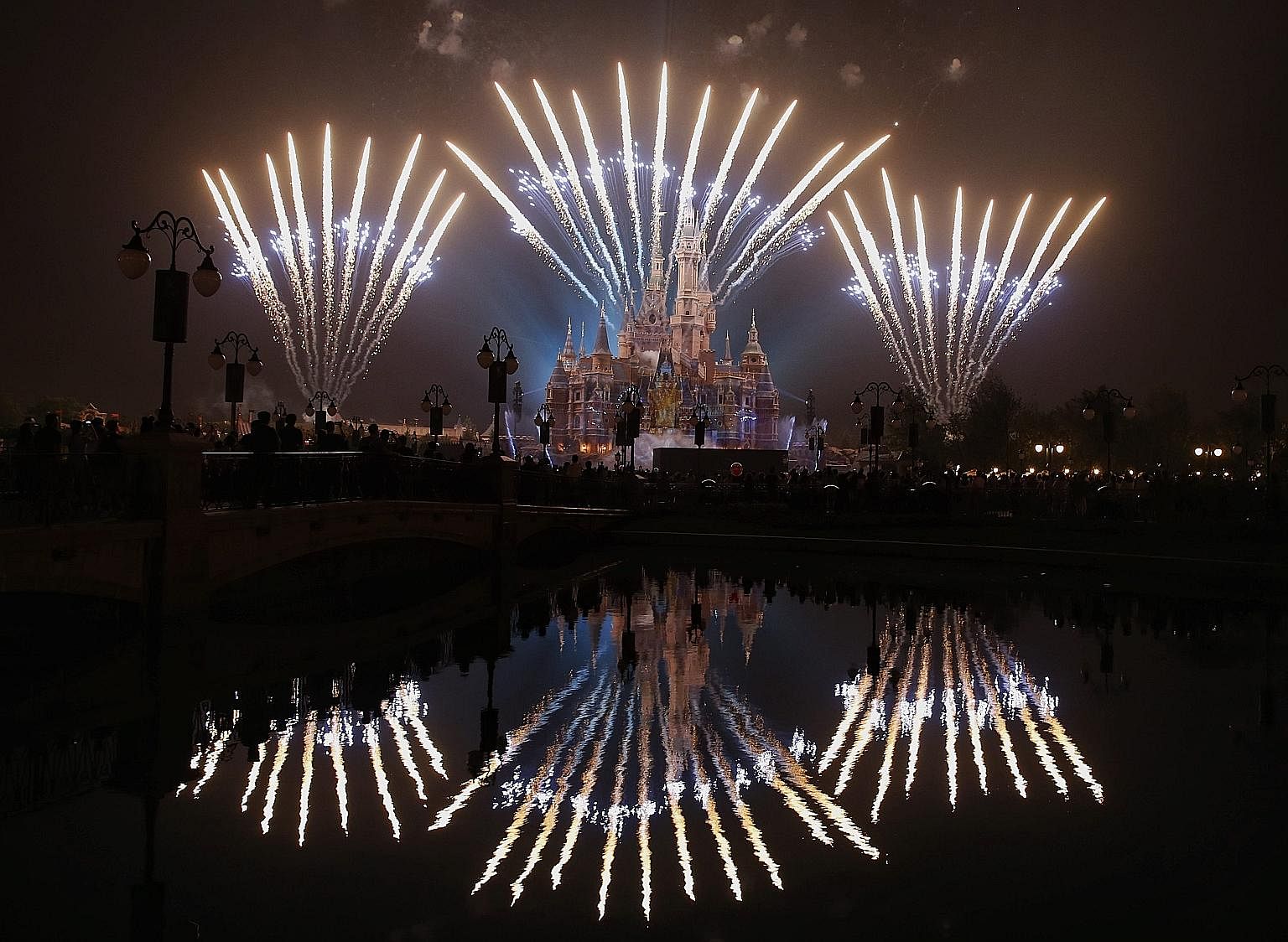 Fireworks lighting up the Enchanted Storybook Castle at the Shanghai Disney Resort which will officially open on June 16.