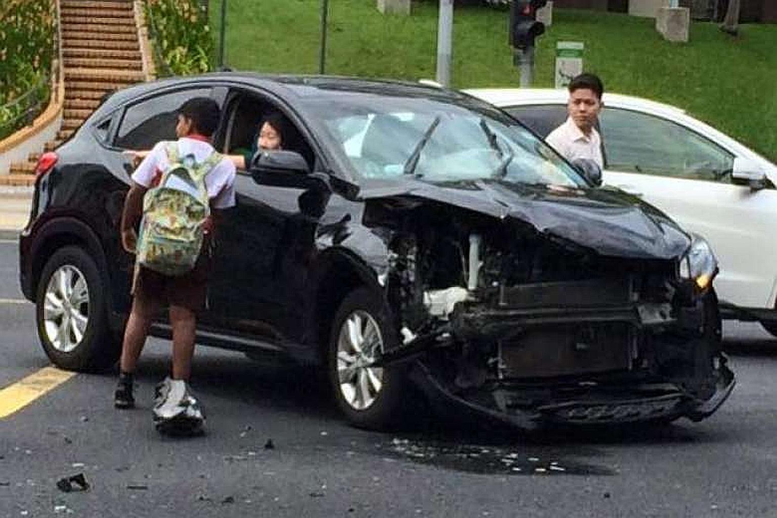Ashvin (left) said he ran over to the victims of the accident as many other passers-by were taking photos instead of lending a hand. He added that "it was just the right thing to do".
