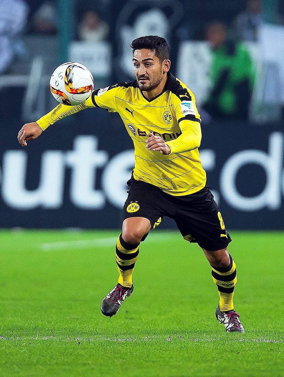 Ilkay Gundogan in action during a German Bundesliga match in January. The midfielder dislocated a knee cap in early May but Manchester City say he is recovering well from the injury.