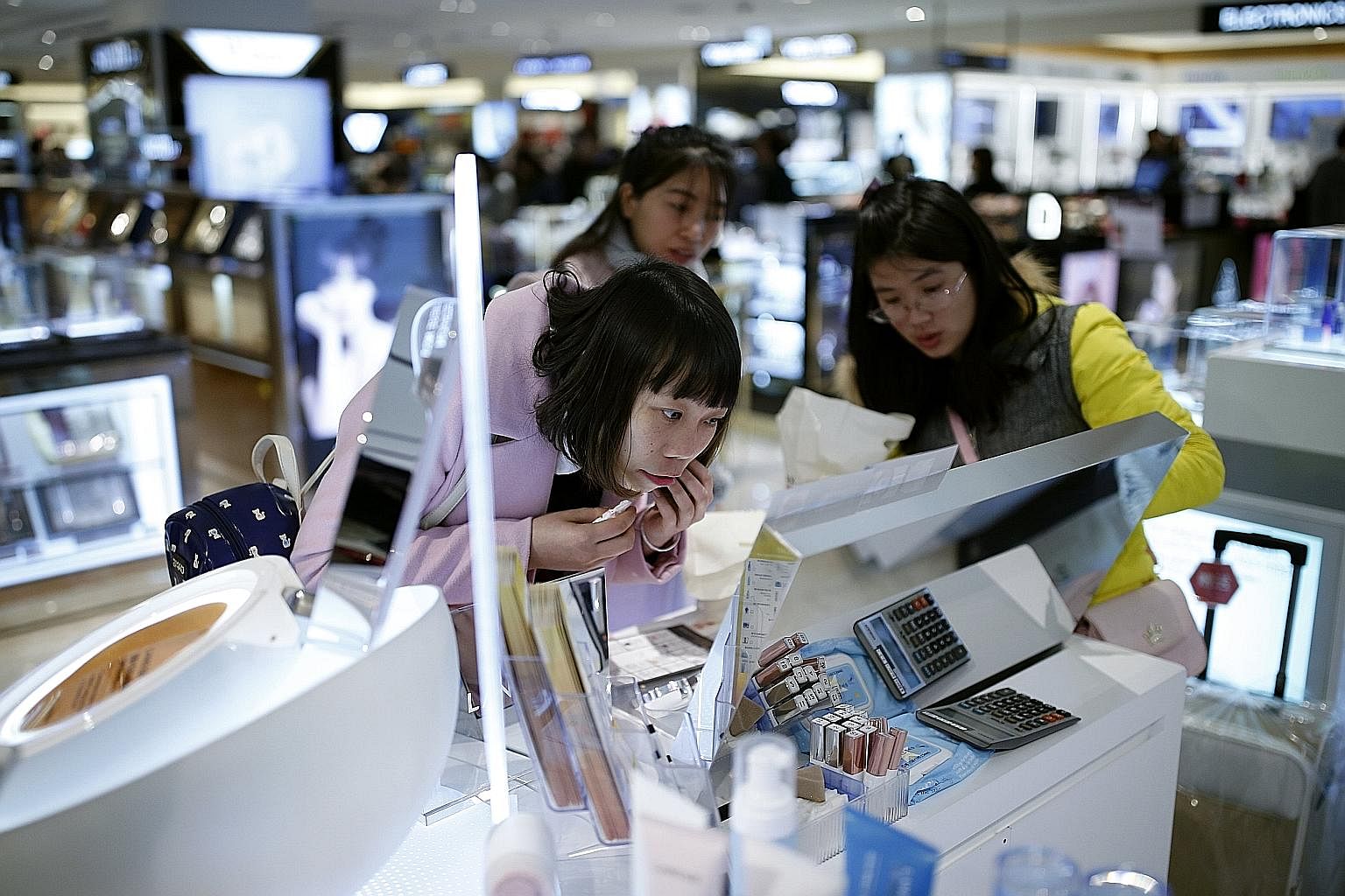 Chinese tourists, seen here in a shop in Seoul, are snapping up foreign goods for their quality and variety as China's manufacturers are not meeting the demands of its increasingly savvy and affluent consumers.