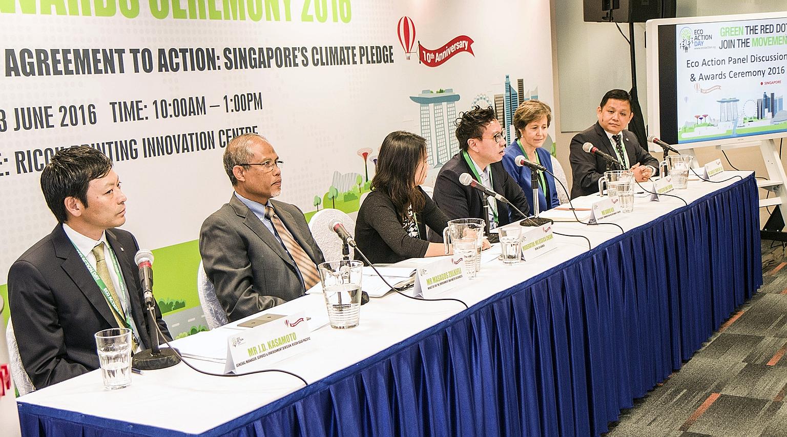 The panel yesterday included (from left) general manager of Ricoh's service and environment division J.D. Kasamoto; Minister Masagos Zulkifli; Eco-Business editor Jessica Cheam; vice-president of communications and sustainability at Unilever David Ki