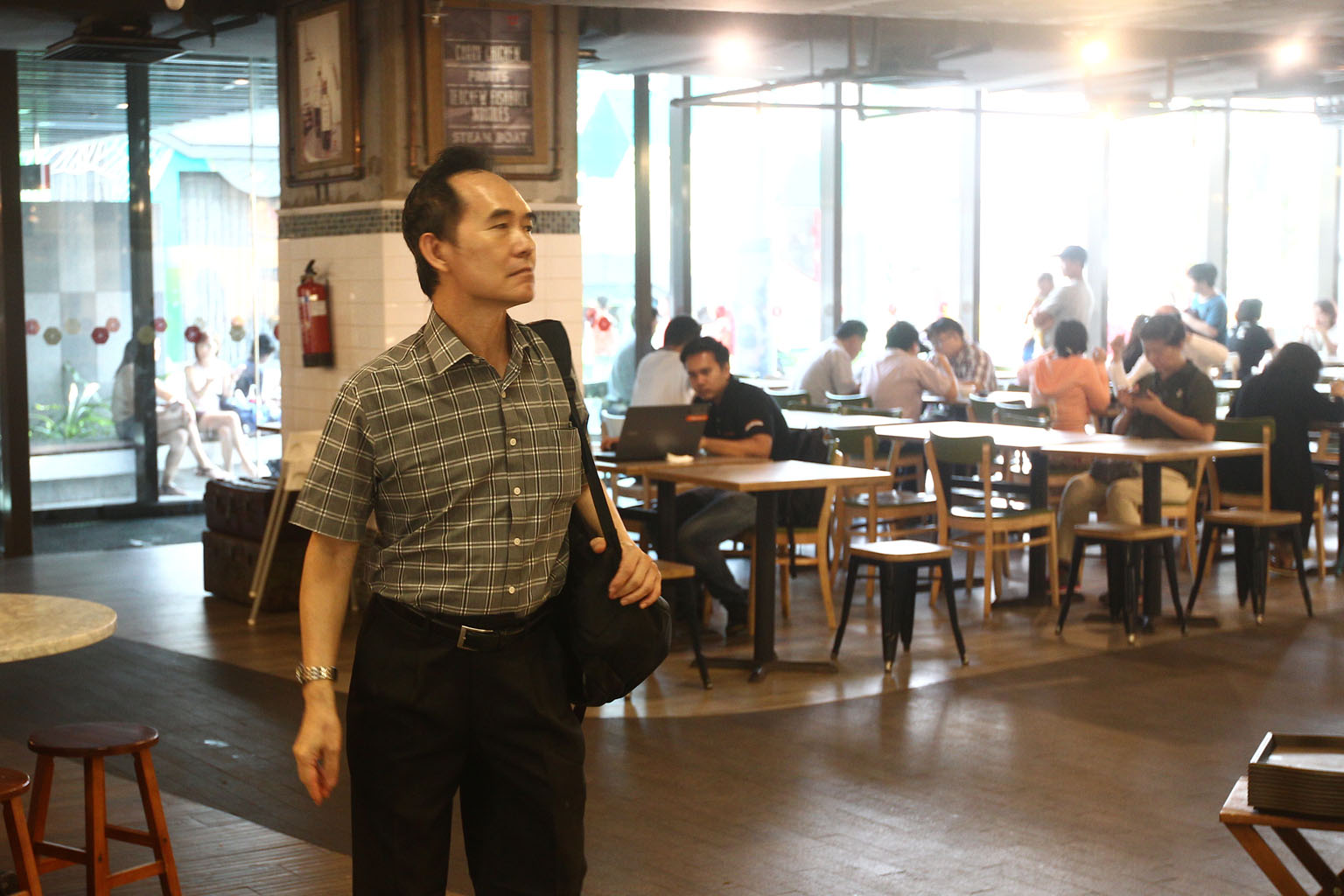 Cleaner Png Lye Heng says he has been working at the Jem foodcourt for a year and does not find the work difficult. He intends to continue to work in this line despite the recent incident when he got yelled at. 