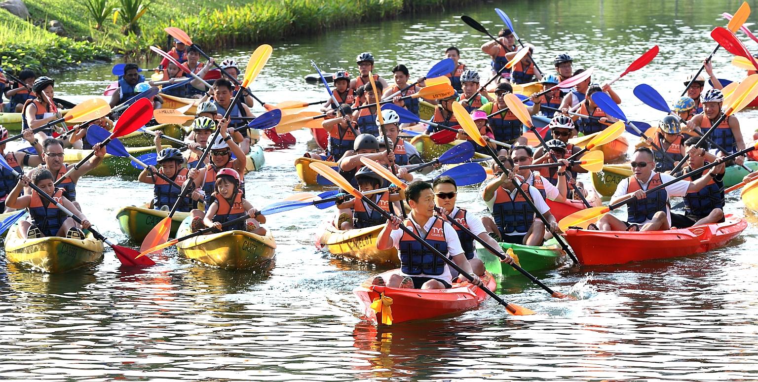 Mr Ong Ye Kung (foreground, centre), who is Acting Minister for Education (Higher Education and Skills) and Senior Minister of State for Defence, participating in the inaugural Safra Punggol Waterway Challenge.