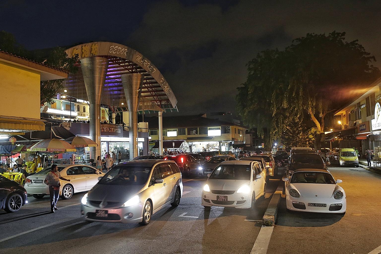 The carpark at Simpang Bedok was full at dinner time last night, with cars circling repeatedly as customers hunted for a parking space.
