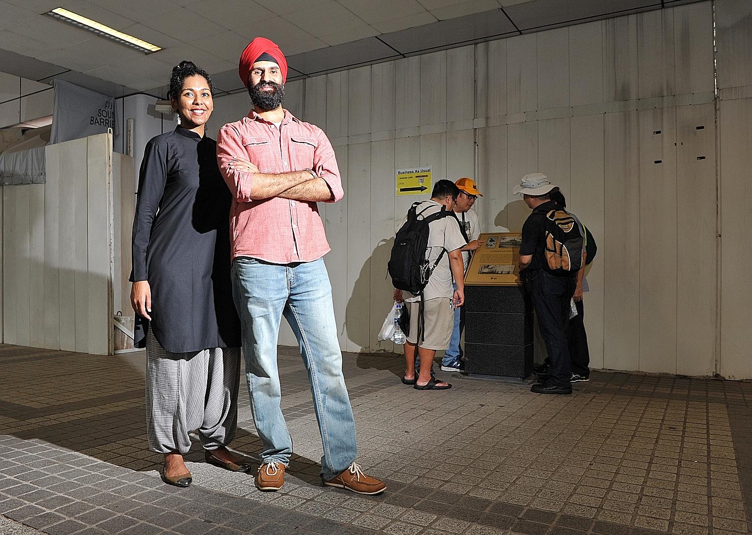 Mr Singh and Ms Vithya near the site of the now-defunct Outram Prison on a trail featured in the Sikh Heritage Trail app.