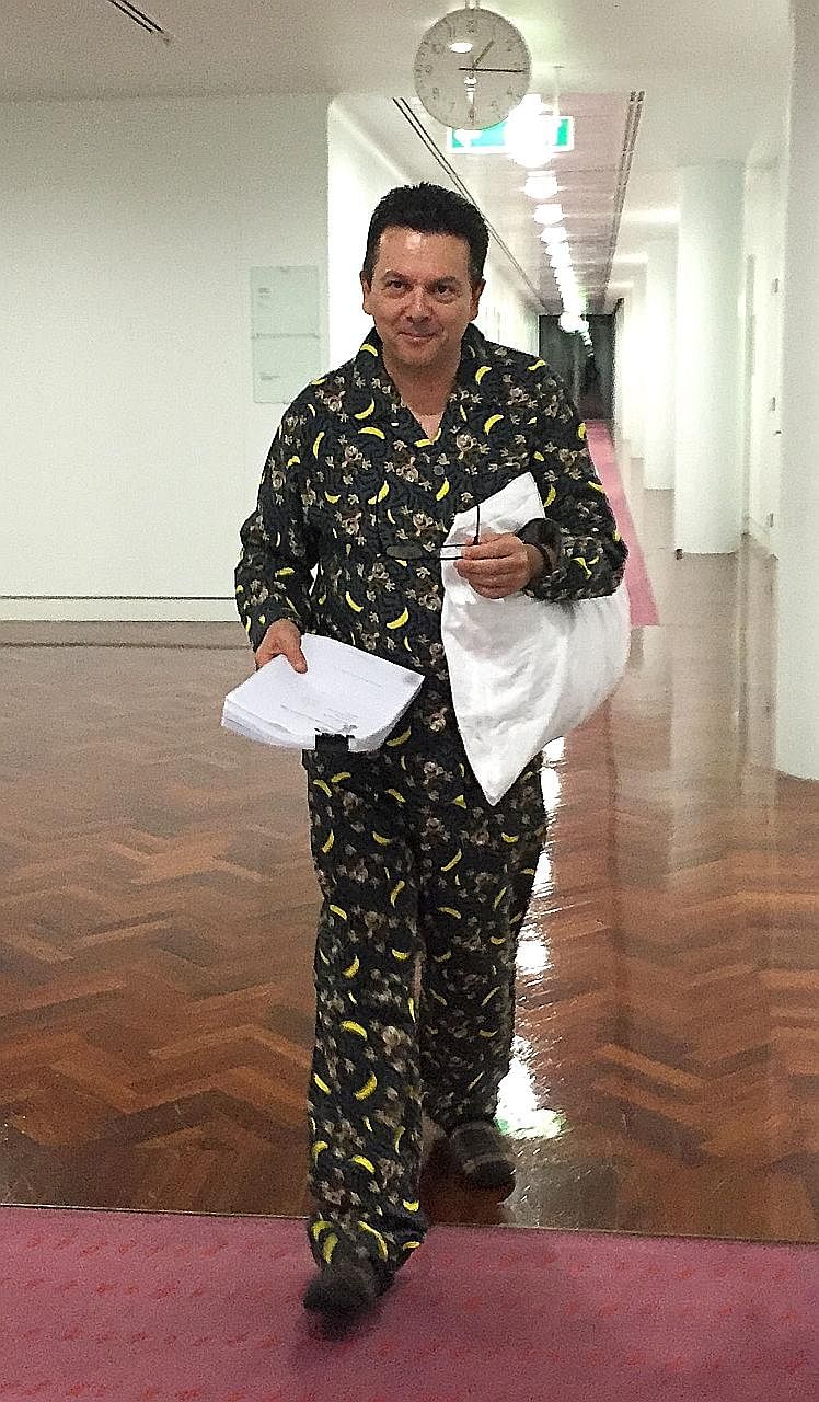 Mr Xenophon arriving in Parliament dressed in pyjamas. The independent MP from South Australia has become known for his headline-grabbing political stunts, often involving costumes or animals.