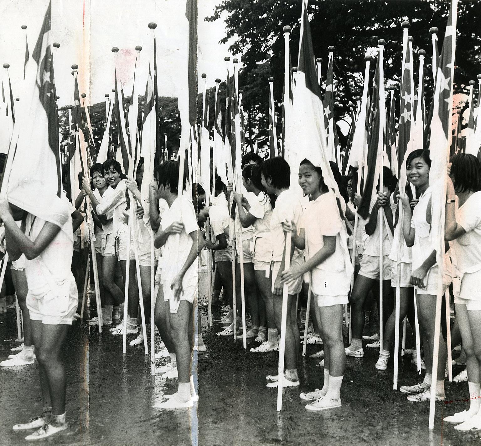 Were you part of this group of schoolgirls from the 1968 National Day Parade's youth contingent, or have you participated in any of the other parades? We want to hear your story for this year's National Day supplement. Send an e-mail to stndpstories@