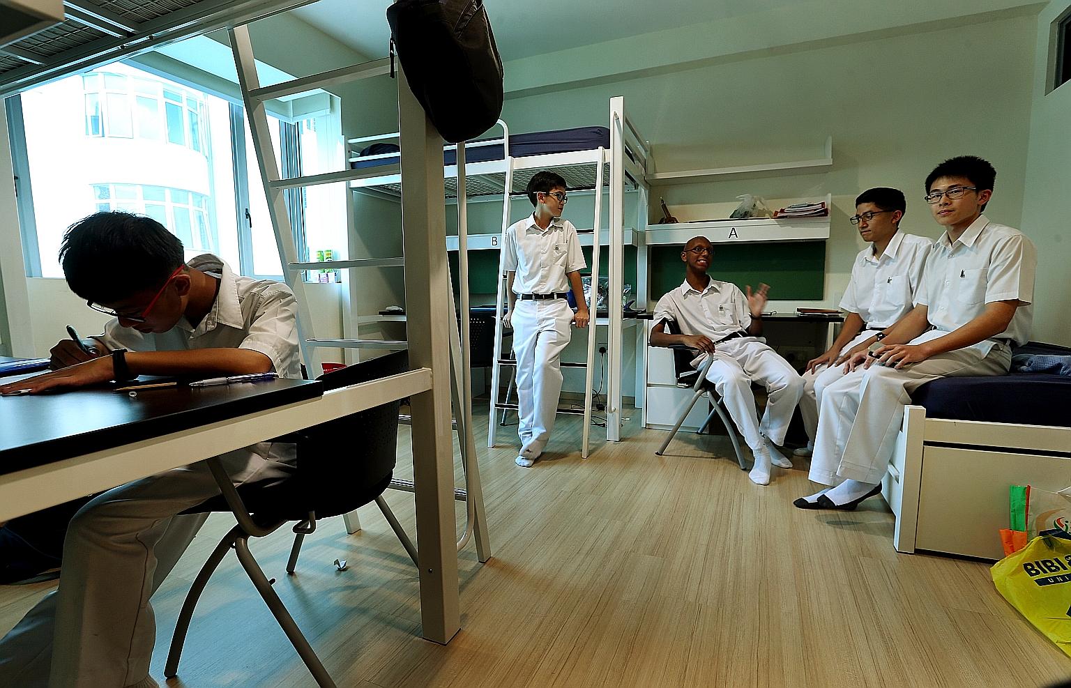 Ashvin (centre) said doing schoolwork in the boarding programme was more efficient with roommates to help. He is pictured with fellow students (from left) Joel Chan, Dylan Tan, Muhammad Dhafer and Low Yan Hao.