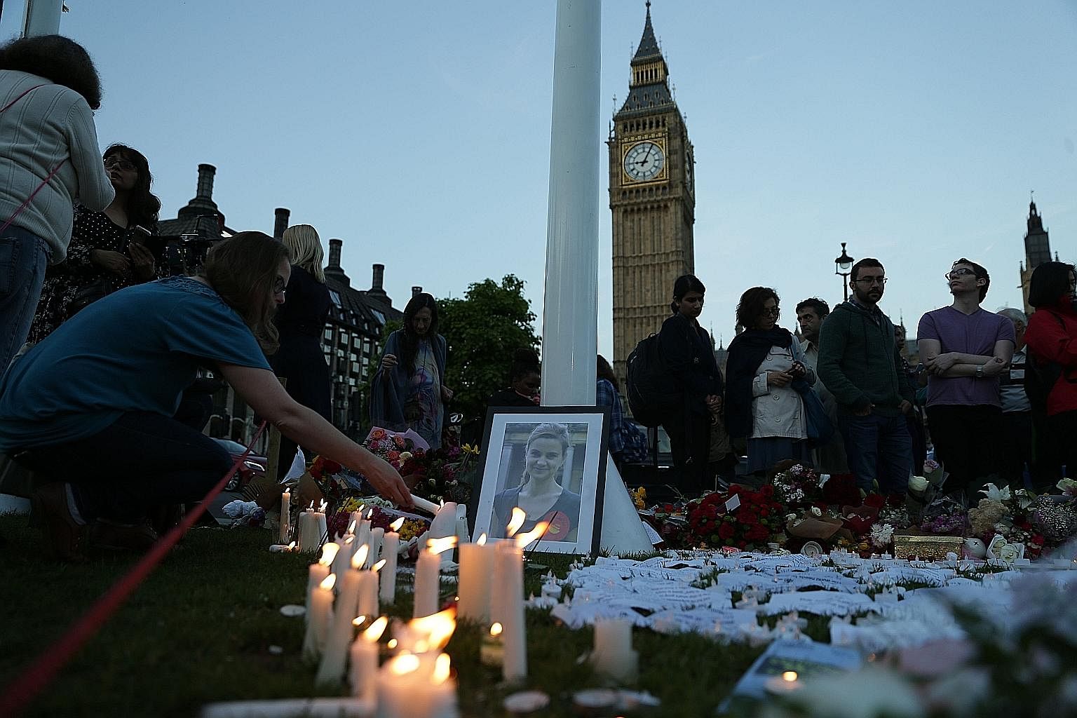 Tributes to slain MP Jo Cox in Parliament Square, London, last Friday. The Labour MP, who was killed in her constituency - Birstall - the day before, had been a fervent supporter of immigration and had campaigned for Britain to remain in the EU. Her 