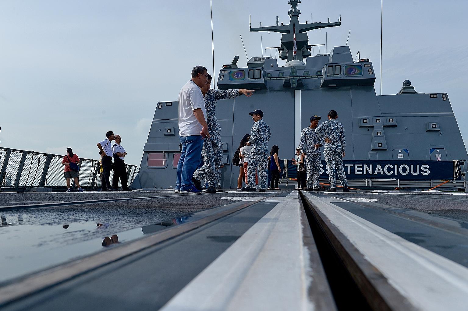Members of the public will be taken on a tour of the 3,200-ton RSS Tenacious (above), and will be shown the ship's missile deck, flight deck, bridge and living quarters. The stealth frigate, with its on-board Sikorsky S-70B naval helicopter, is docke